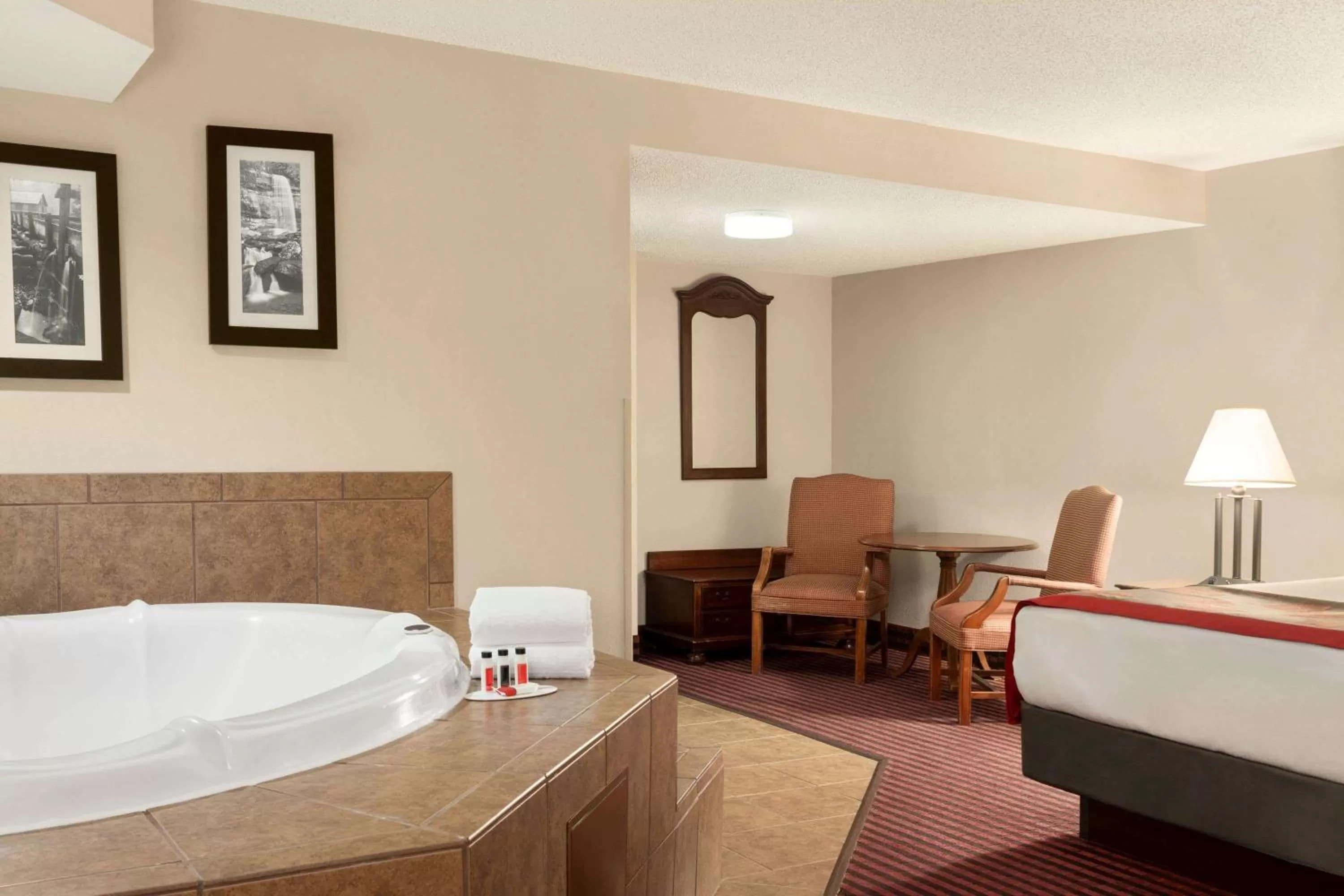 Photo of the whole room, Bed in Ramada by Wyndham Pigeon Forge North