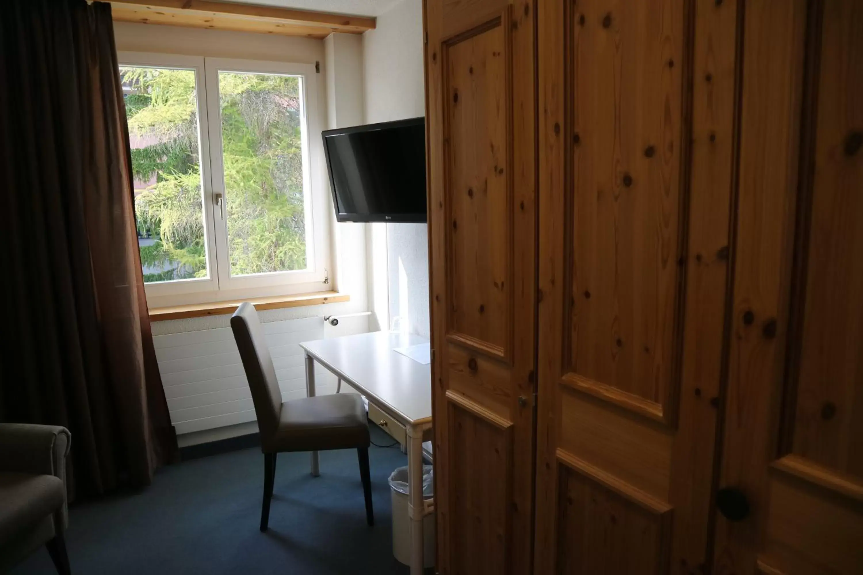 Bedroom, Seating Area in Spenglers Inn