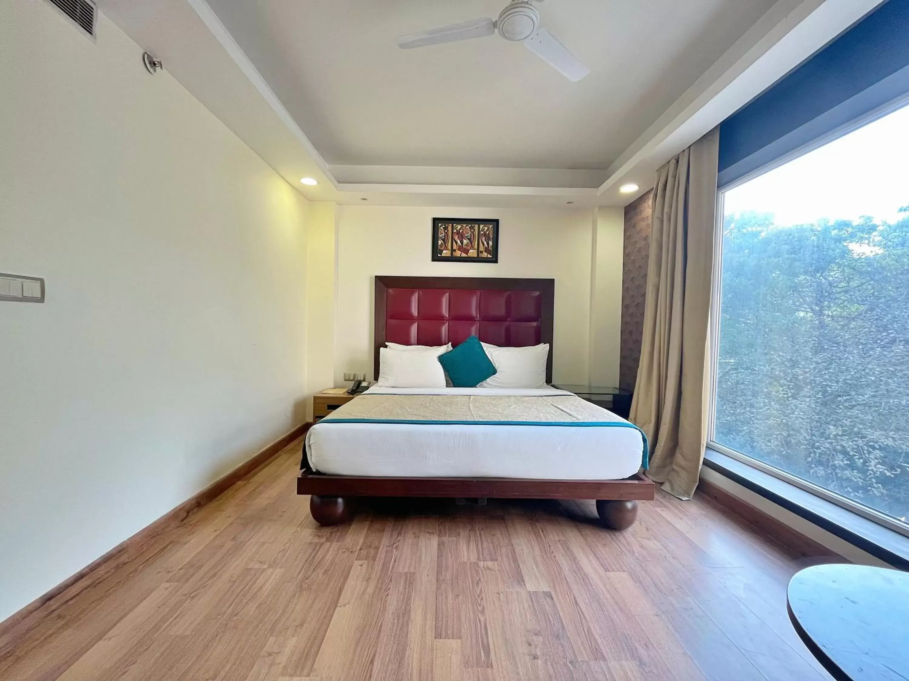 Photo of the whole room, Bed in The Grand Orion - Kailash Colony