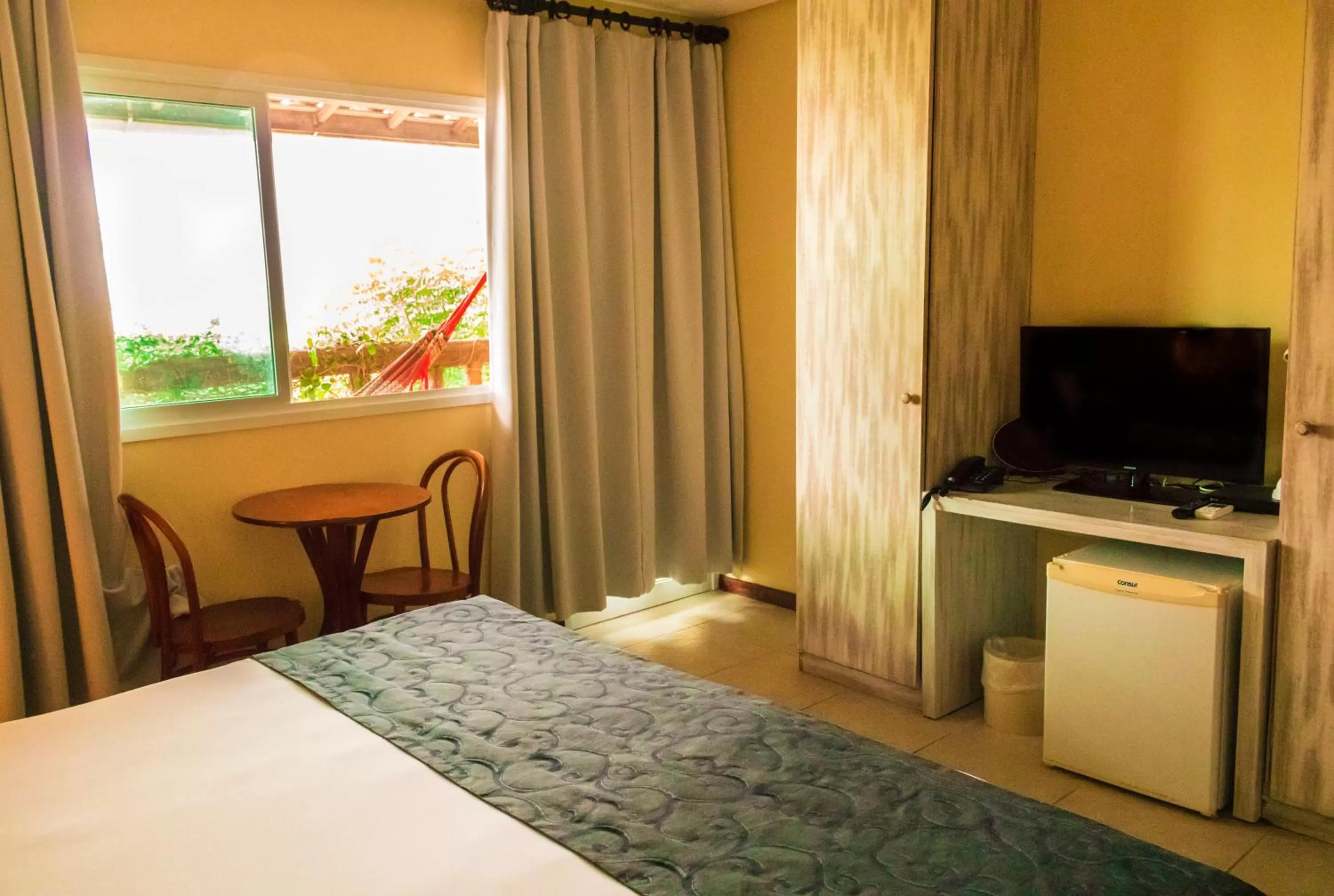 Bed in Farol de Itapuã Praia Hotel