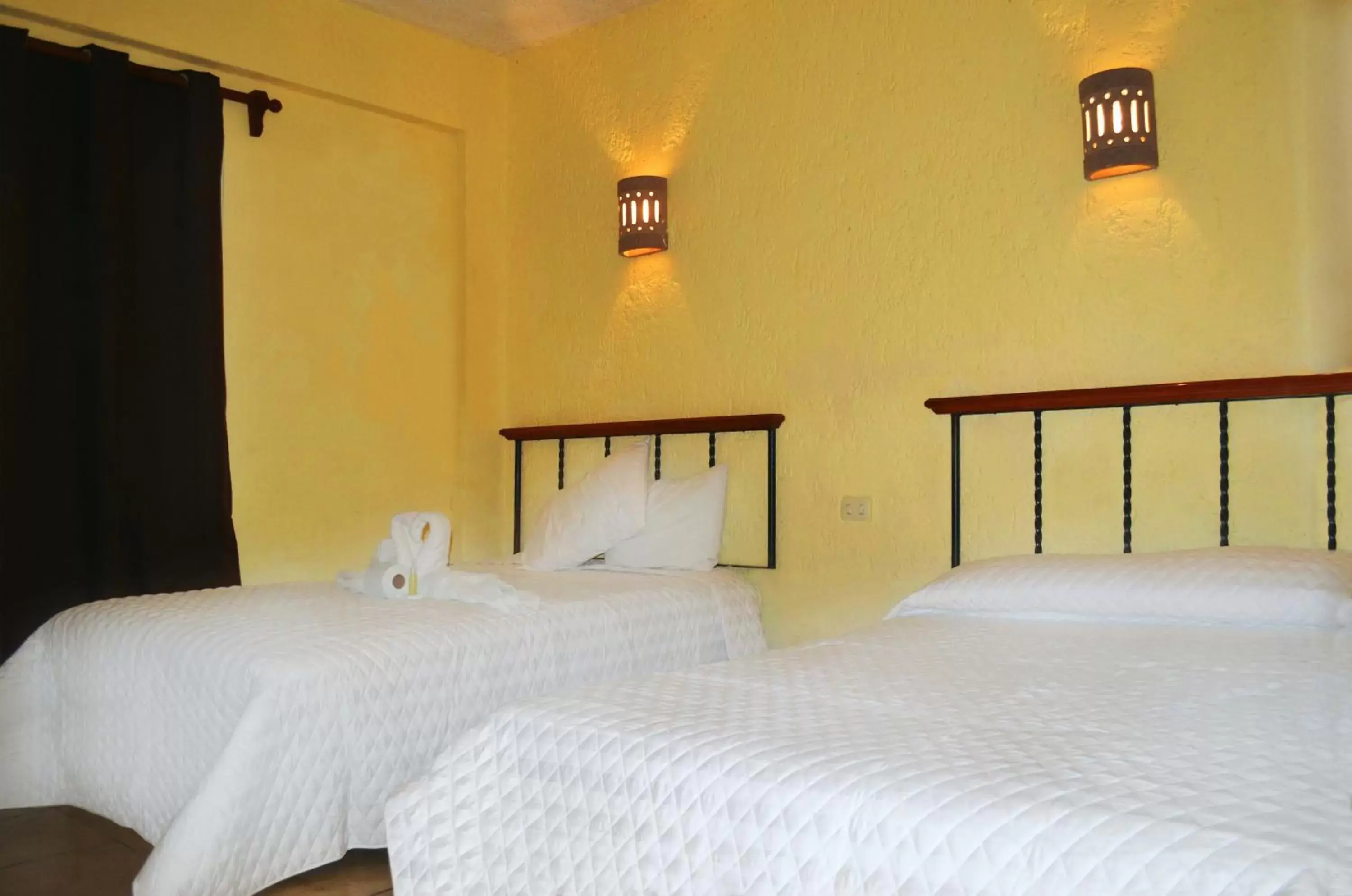 Bed in Hotel Hacienda Cancun