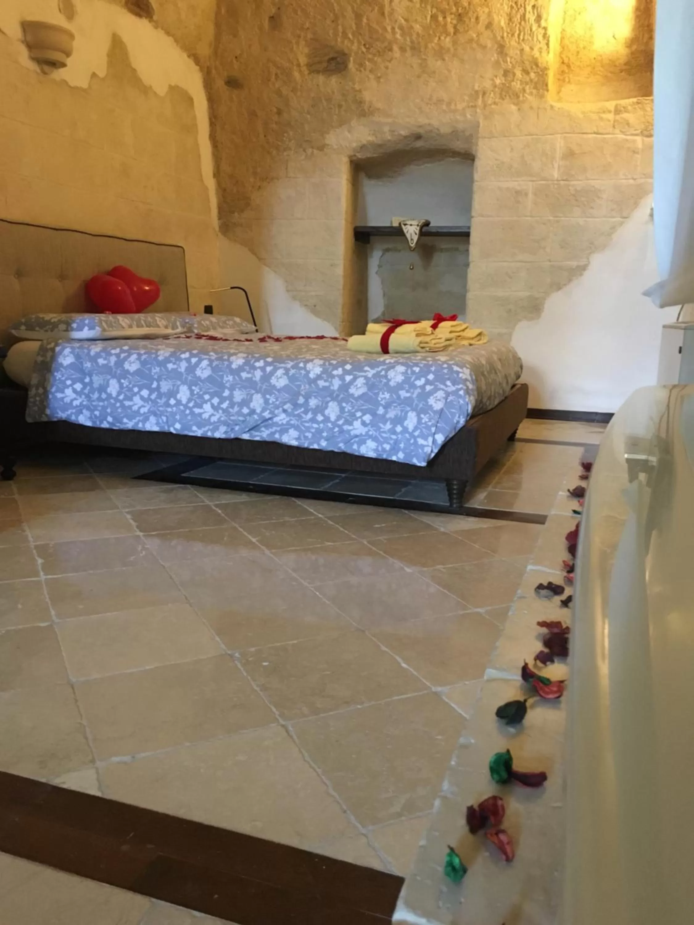 Bed in Alla dimora di Chiara Suite and Rooms