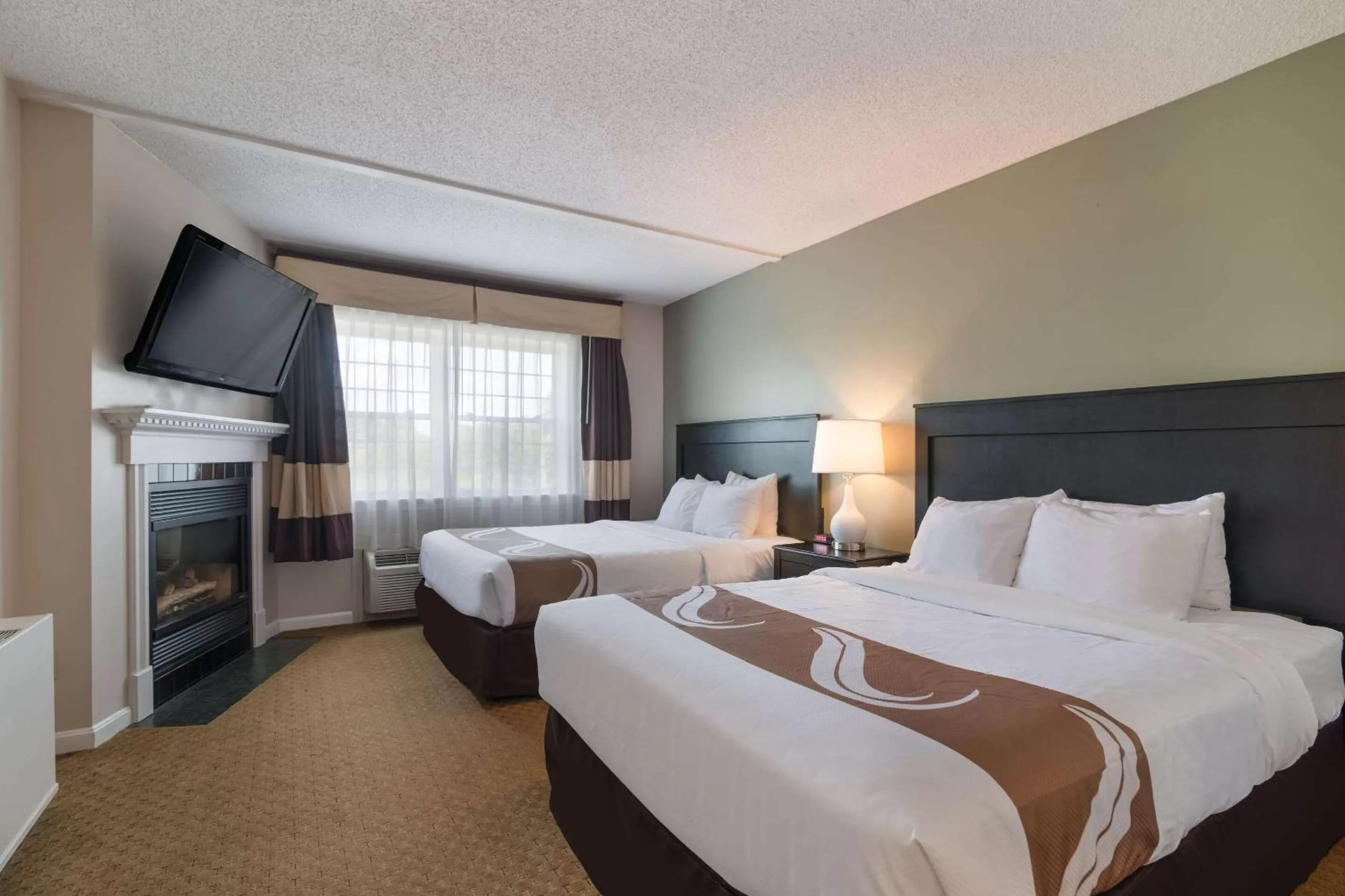 Photo of the whole room, Bed in Quality Inn & Suites