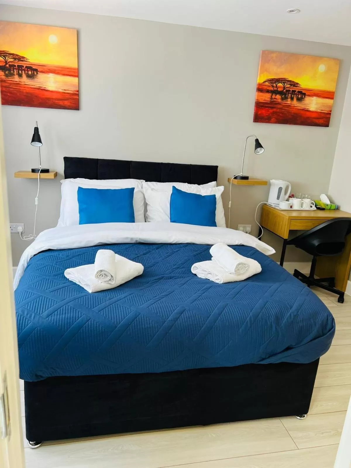 Photo of the whole room, Bed in Indigo Suites