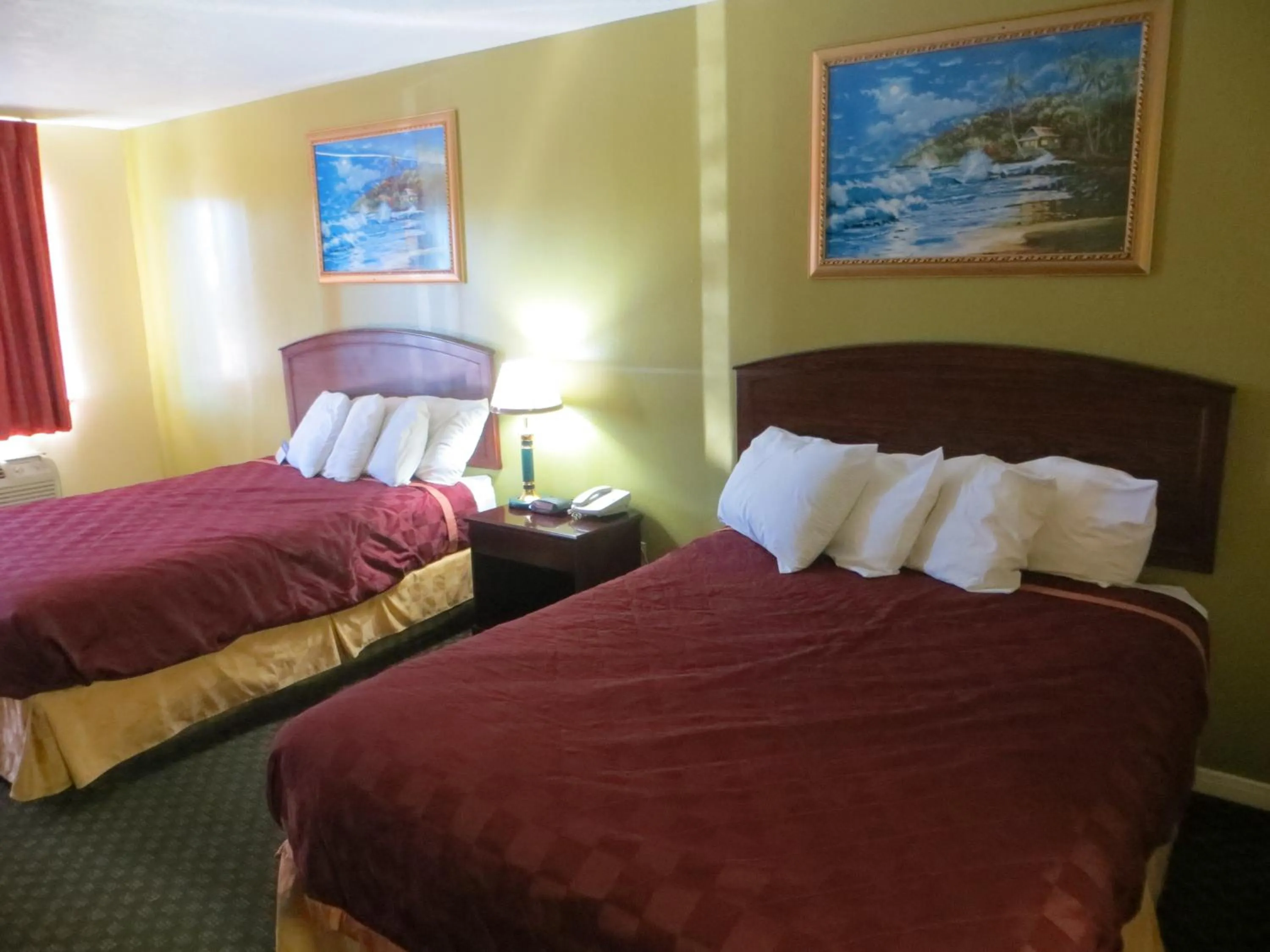 Bed in Americas Best Value Inn & Suites Hempstead