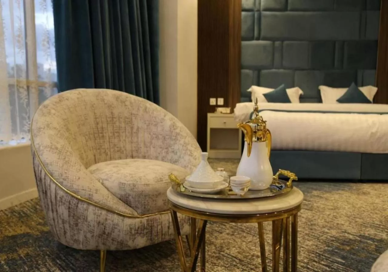 Seating area, Bed in شقق ارين المطار