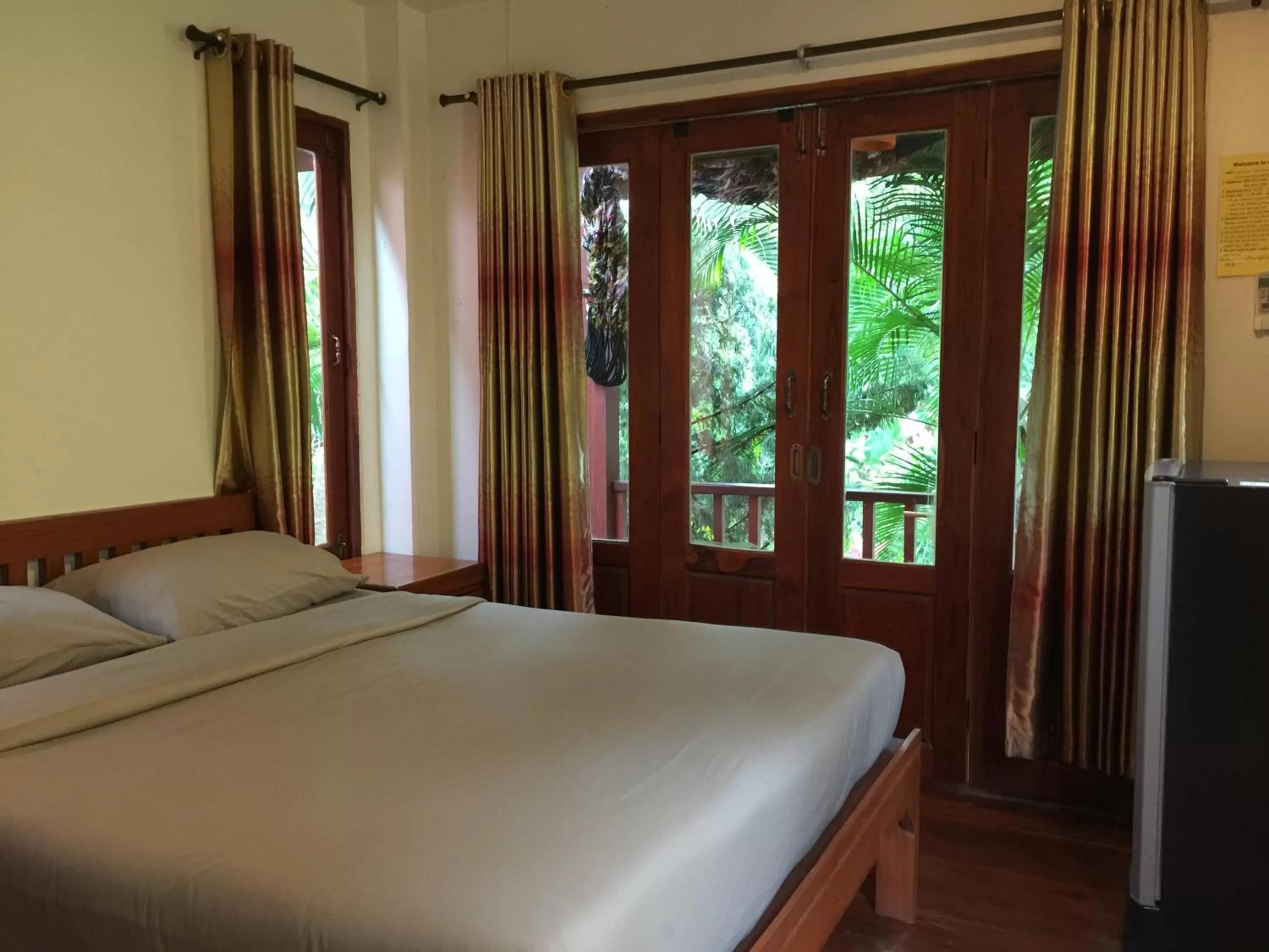 Bed in Pai Loess Resort