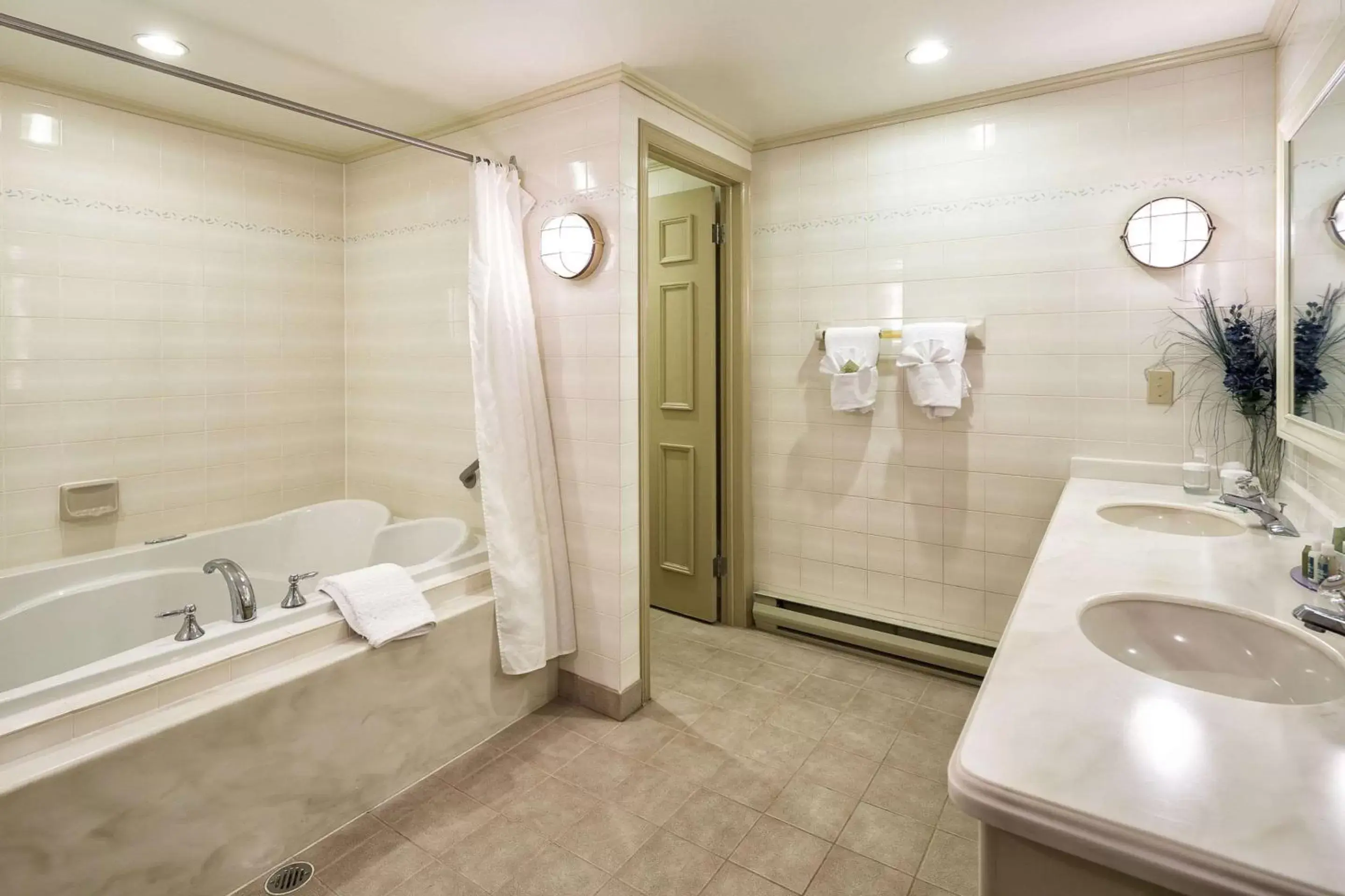 Bathroom in Inn on the Lake, Ascend Hotel Collection