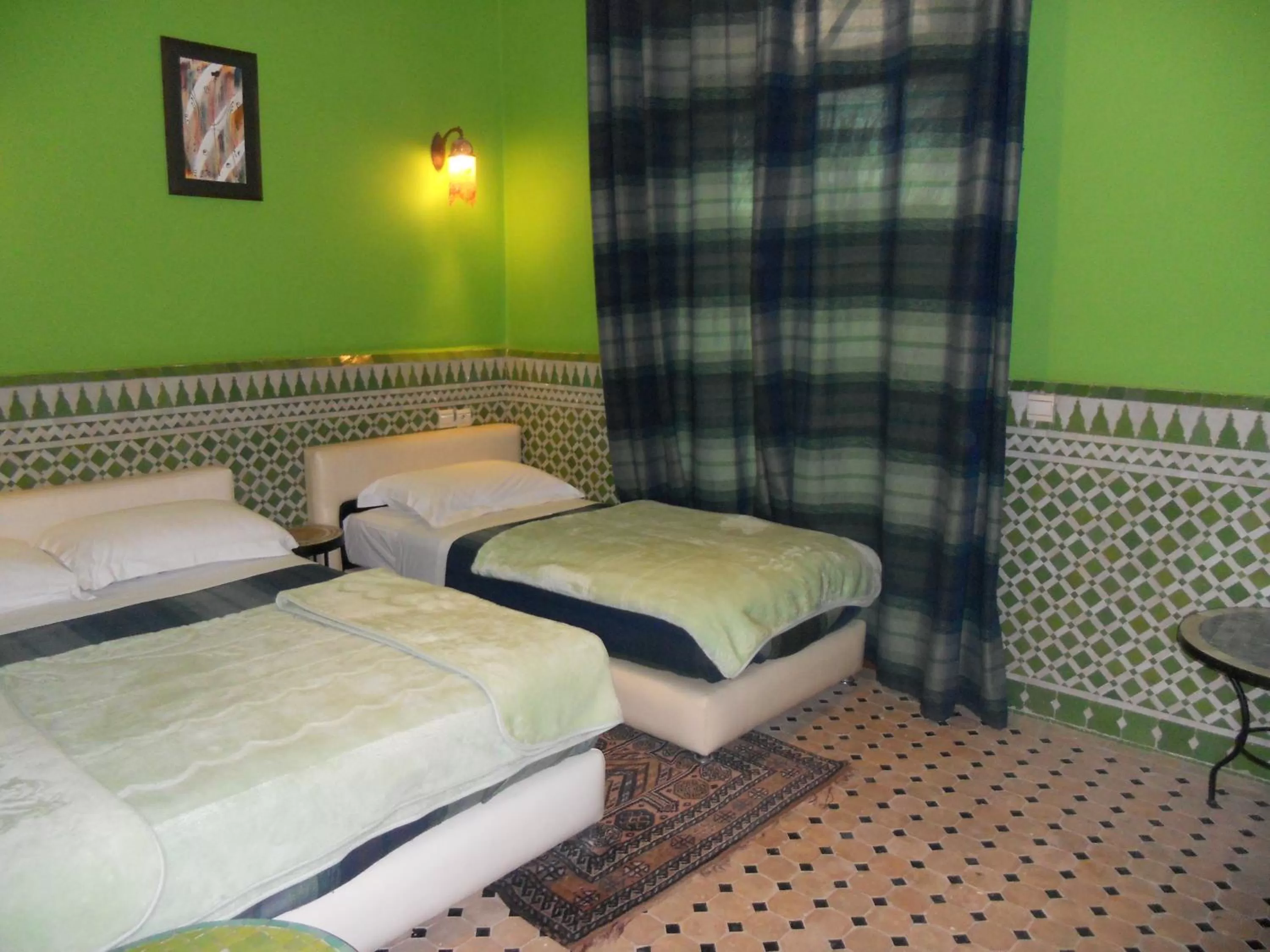 Bed in Riad Passiflora