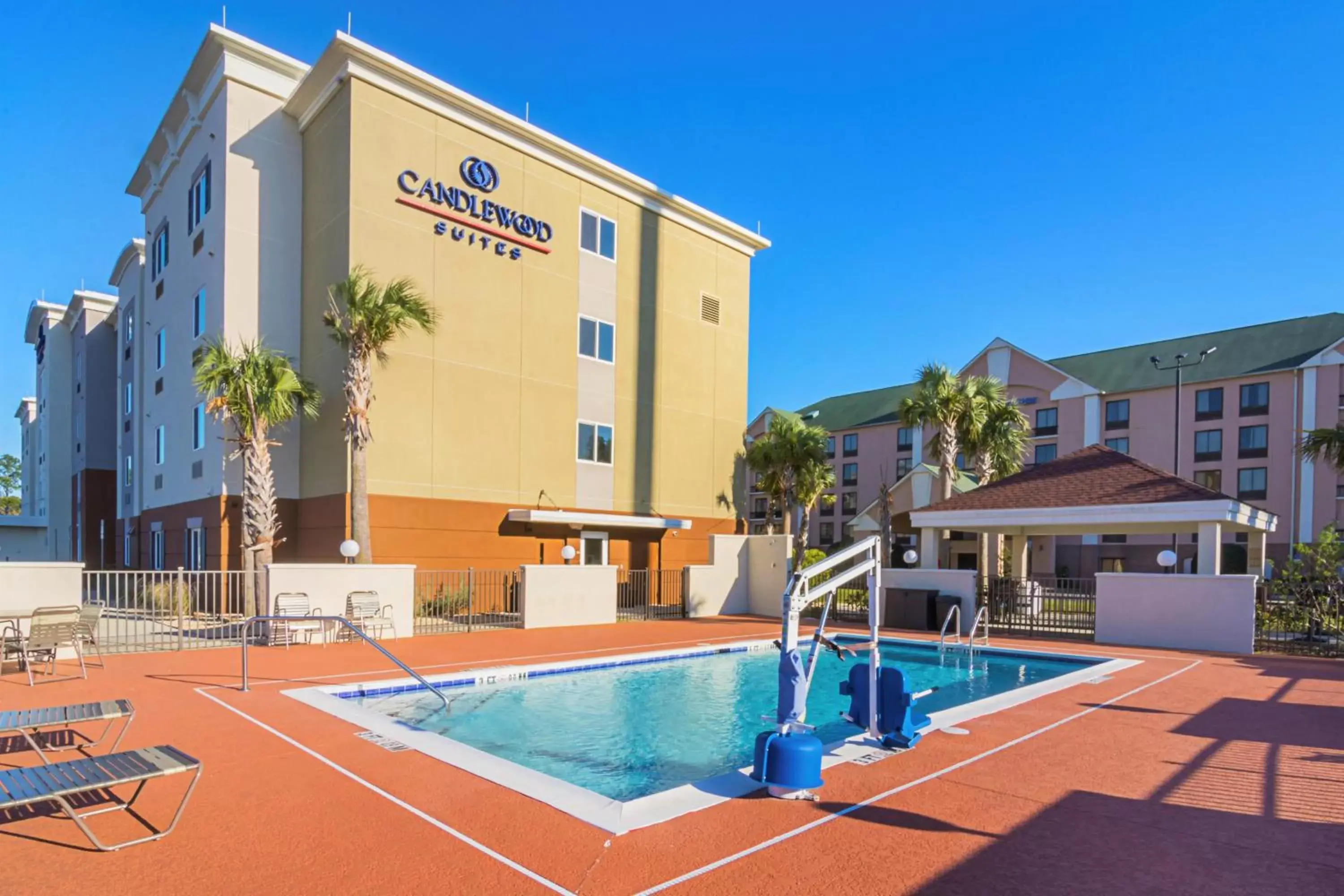 Swimming pool, Property Building in Candlewood Suites - Pensacola - University Area, an IHG Hotel