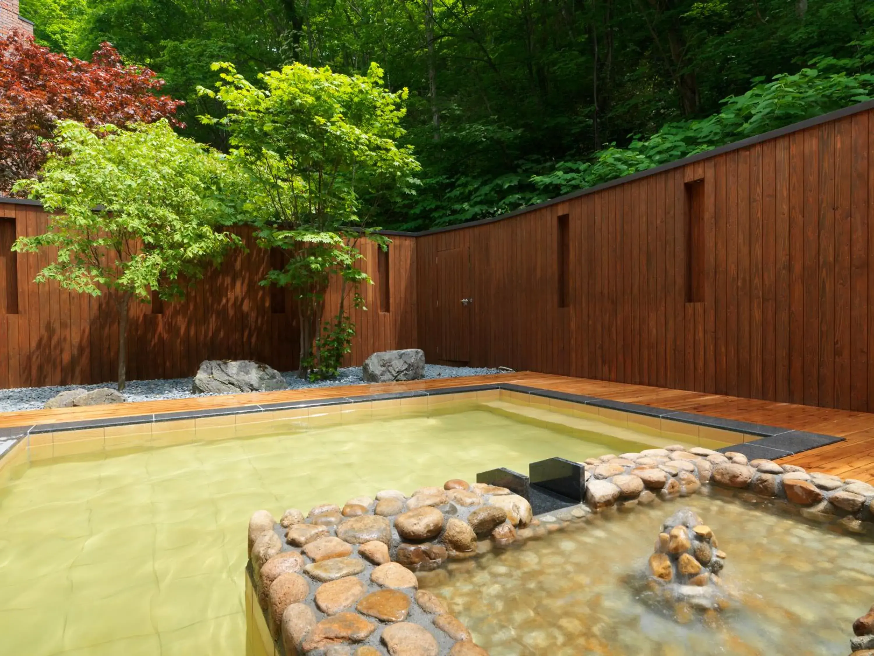 Hot Spring Bath, Swimming Pool in Niseko Konbu Onsen Tsuruga Besso Moku No Sho