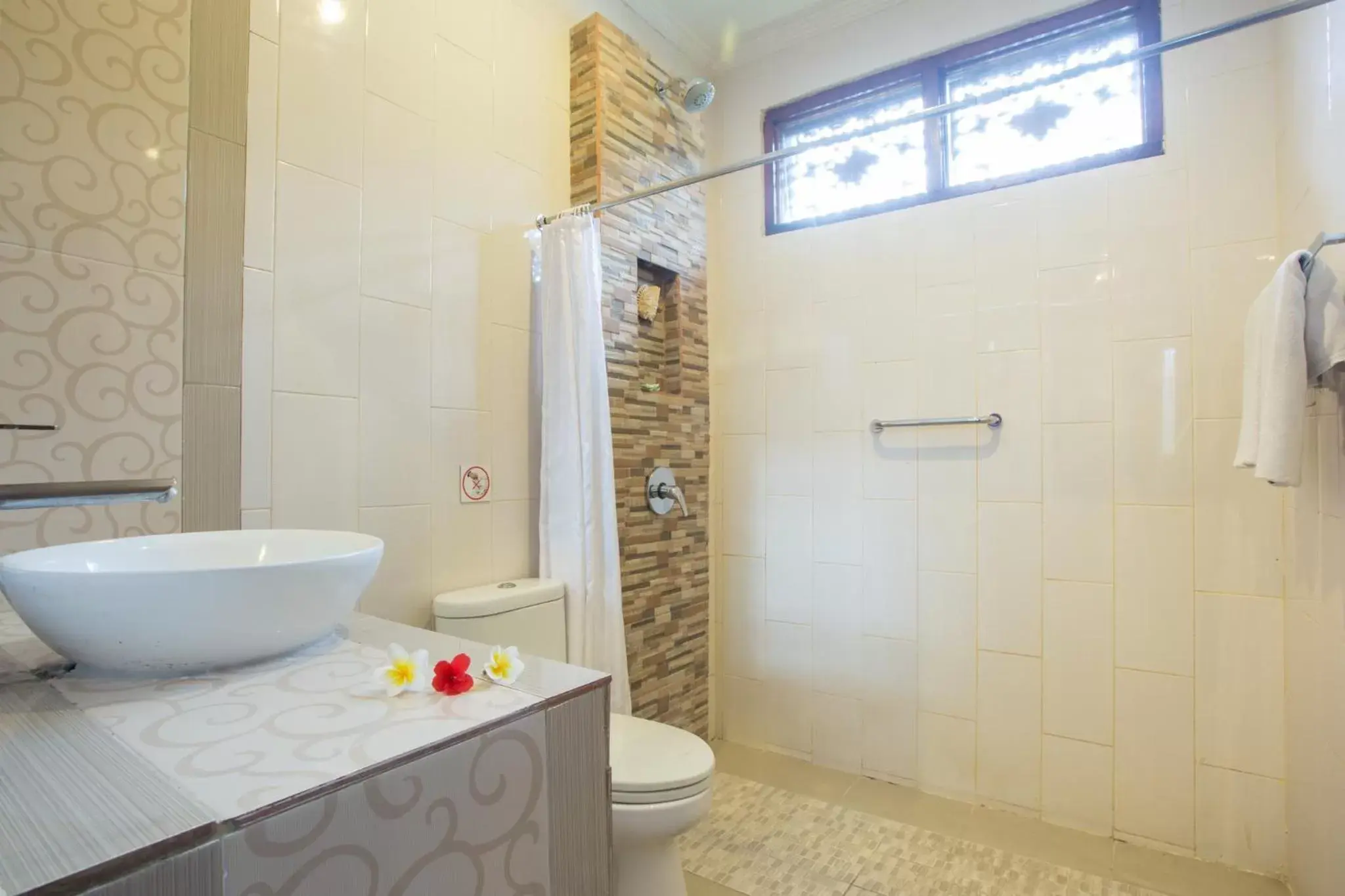 Bathroom in Sinar Bali Hotel