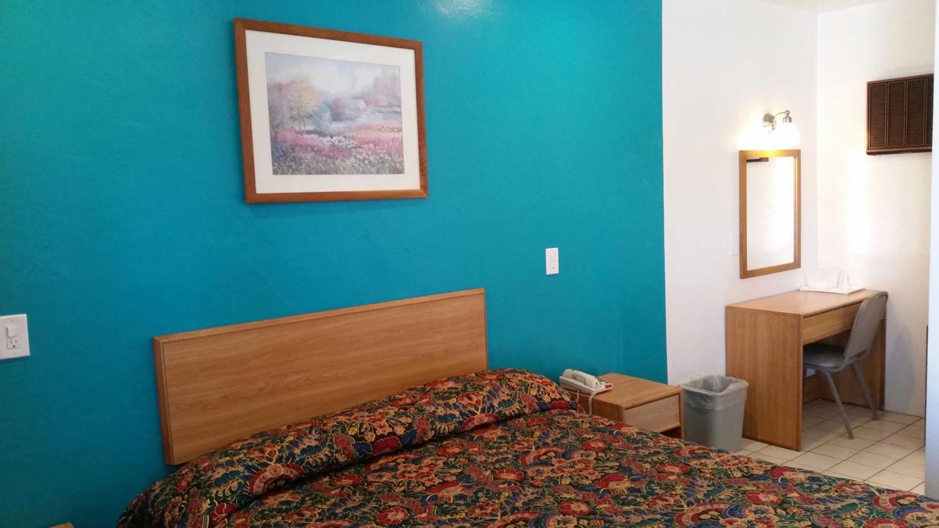 Bed in Economy Inn Motel