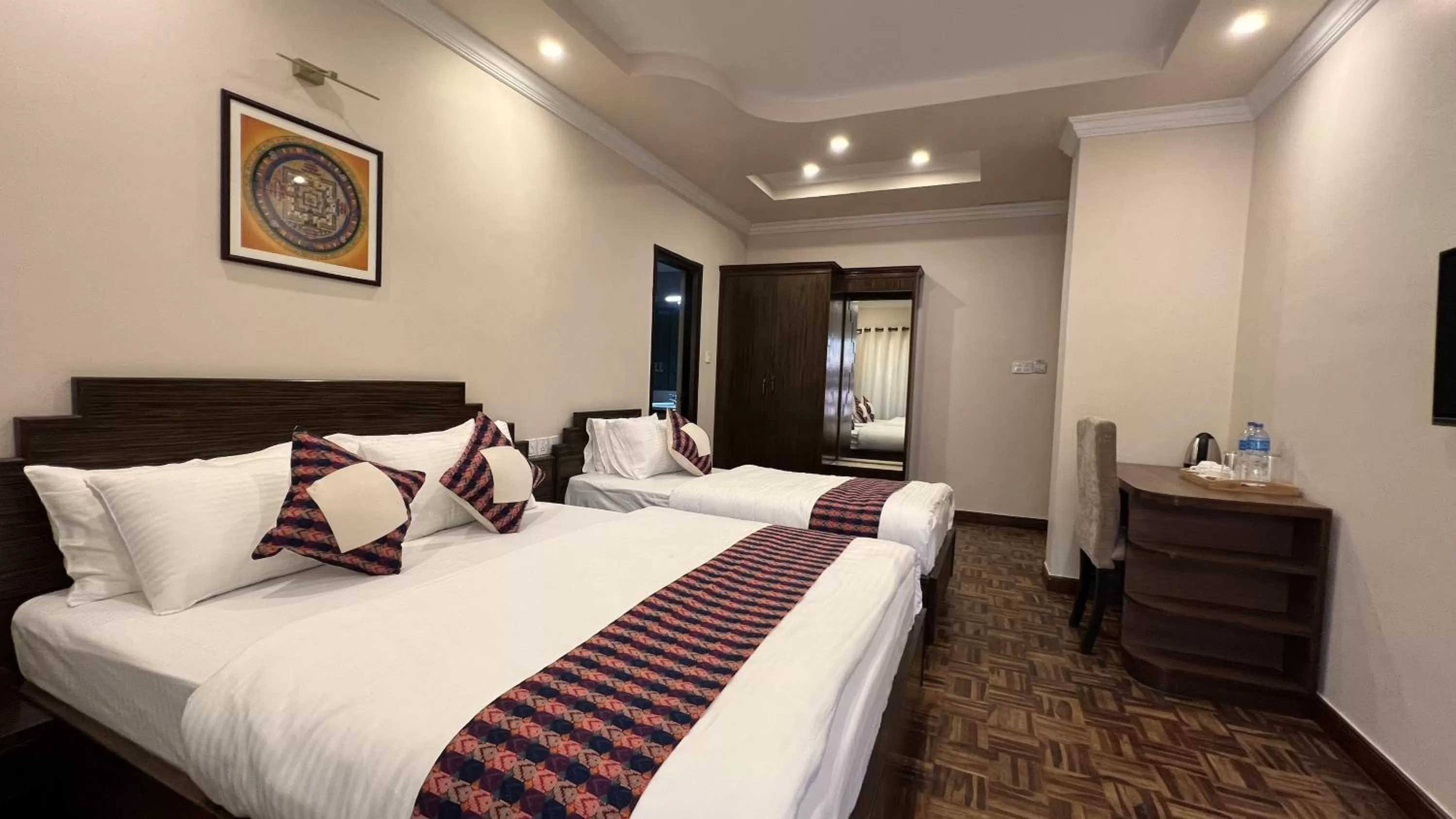 Seating area, Bed in Mandala Heritage Inn