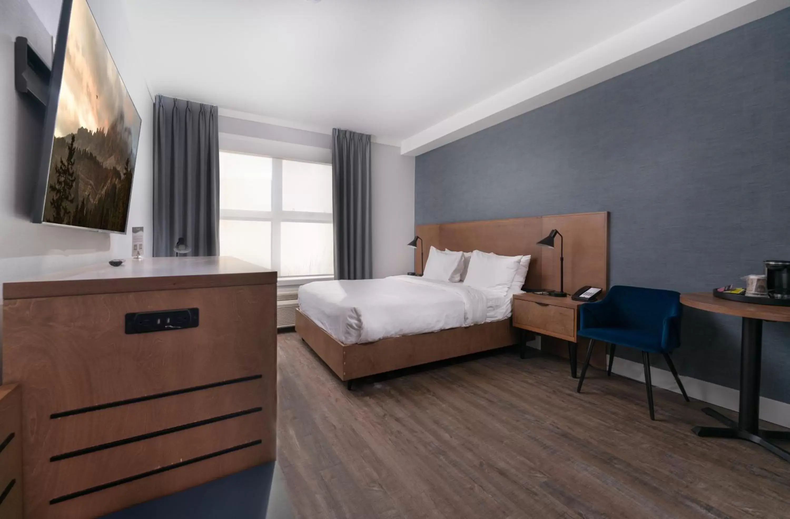 Bed in Prestige Kamloops Hotel