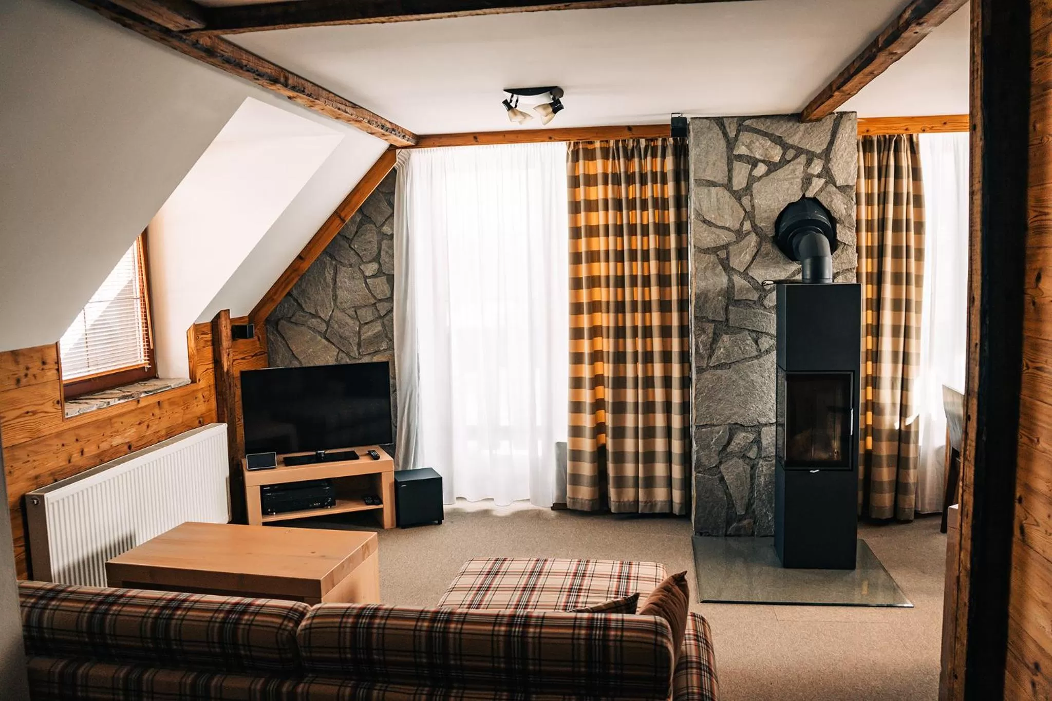 Living room, Bed in APLEND Hotel Kukučka