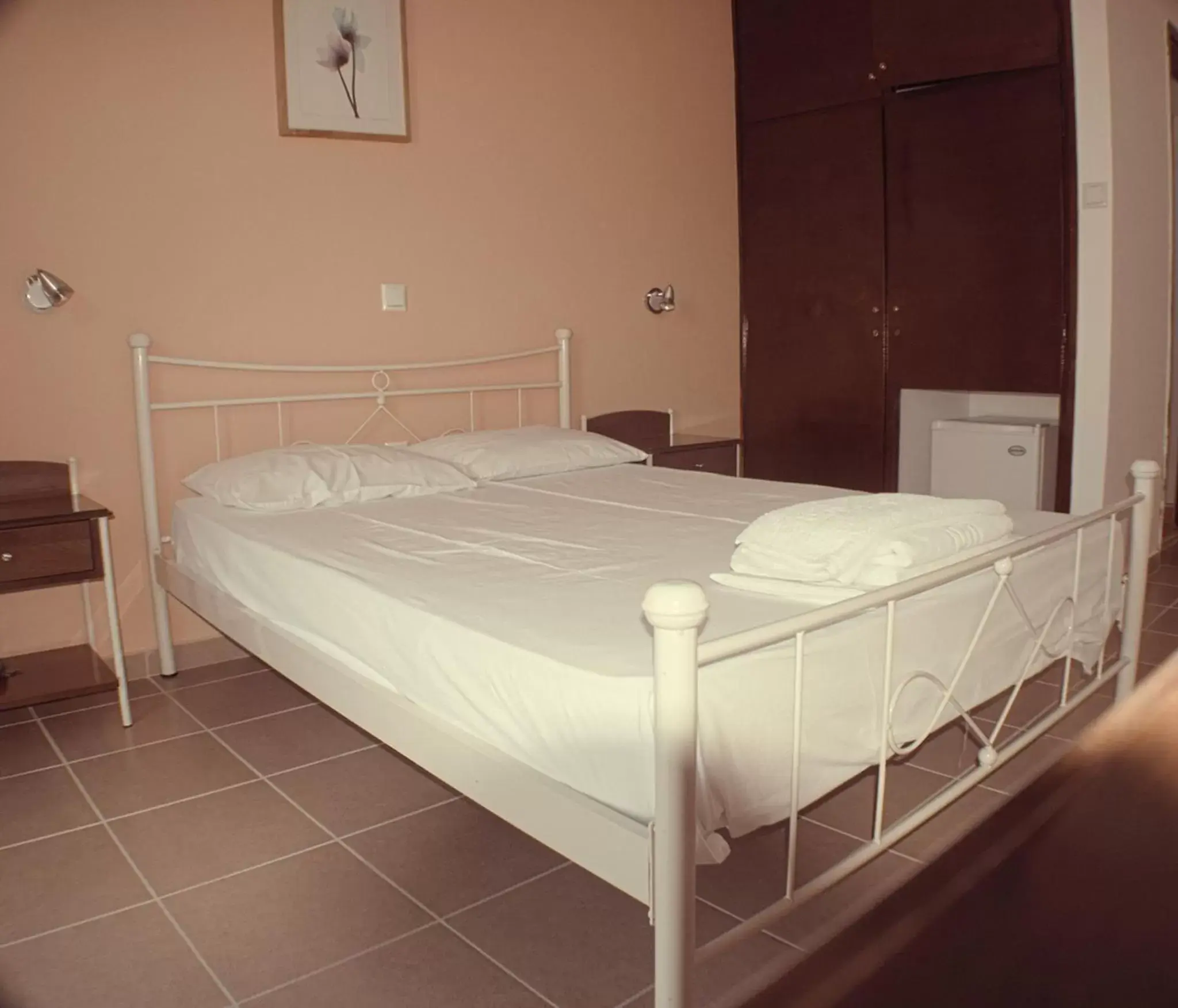 Bed in Nikolaki Rooms