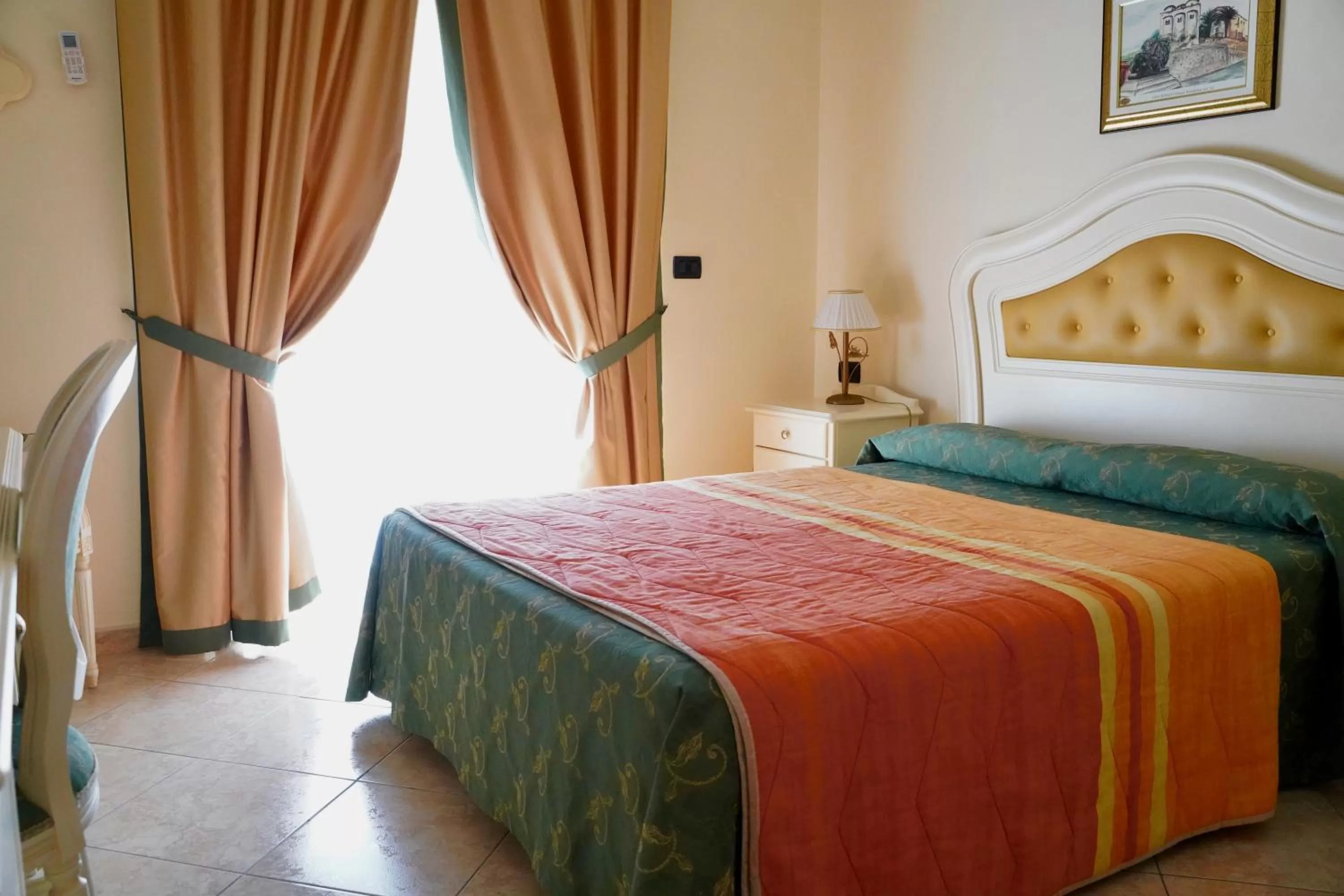 Bedroom in Hotel Roscianum Welness SPA