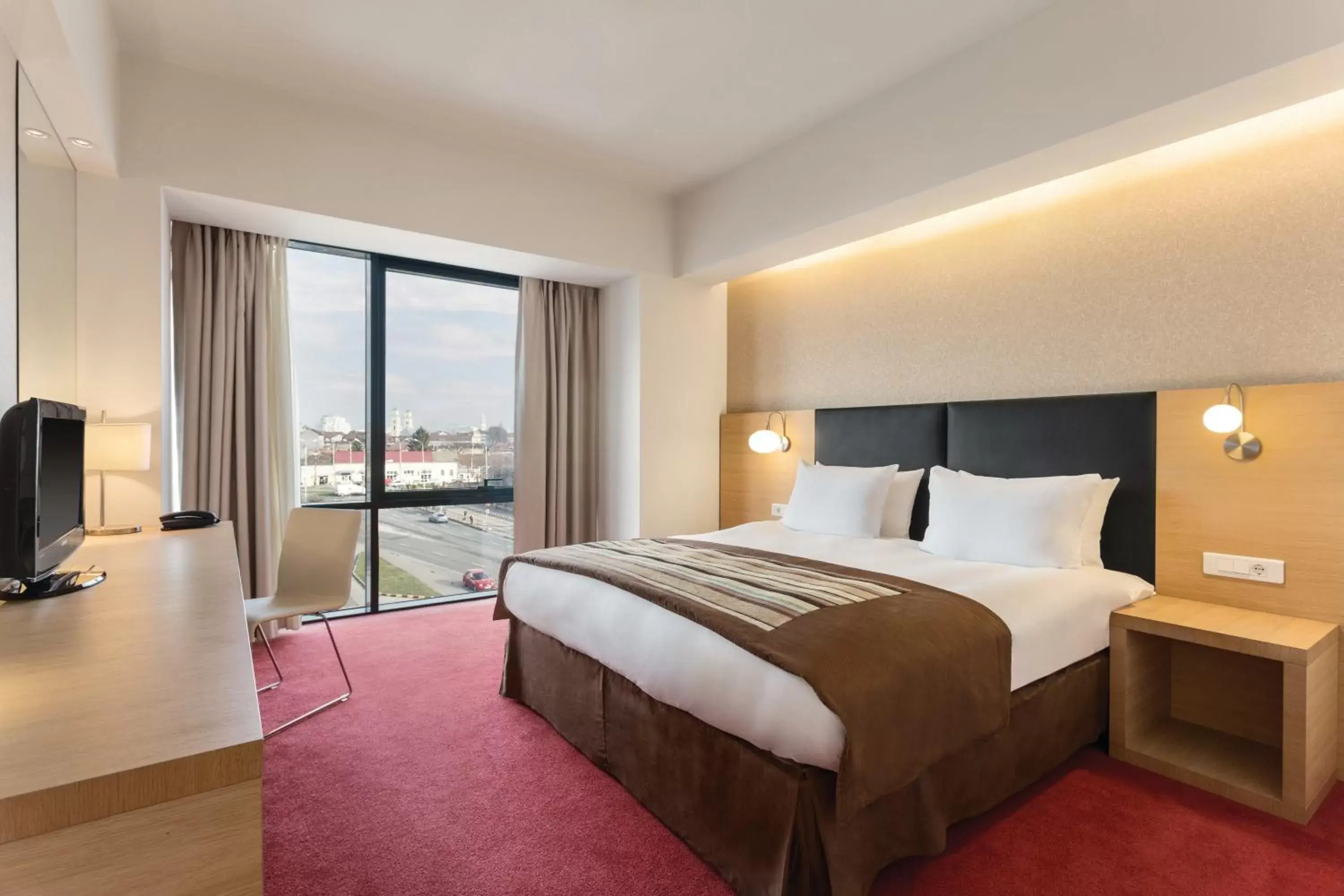 Bed in Ramada by Wyndham Oradea Bed in Ramada by Wyndham Oradea