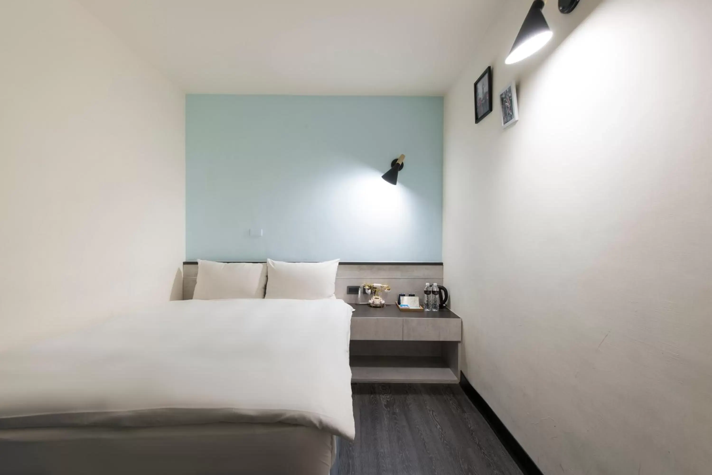 Bed in Raise Hotel Taichung