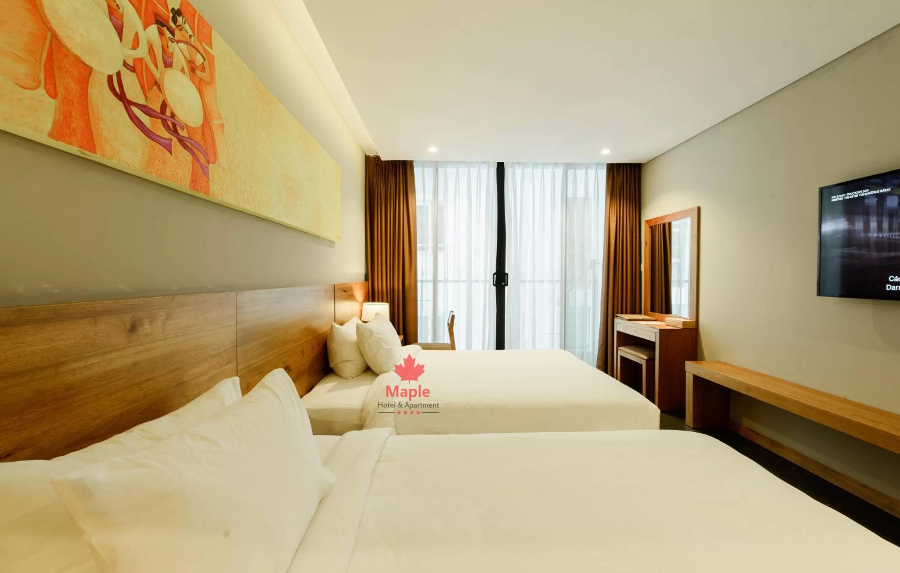 Bed in Maple Hotel & Apartment