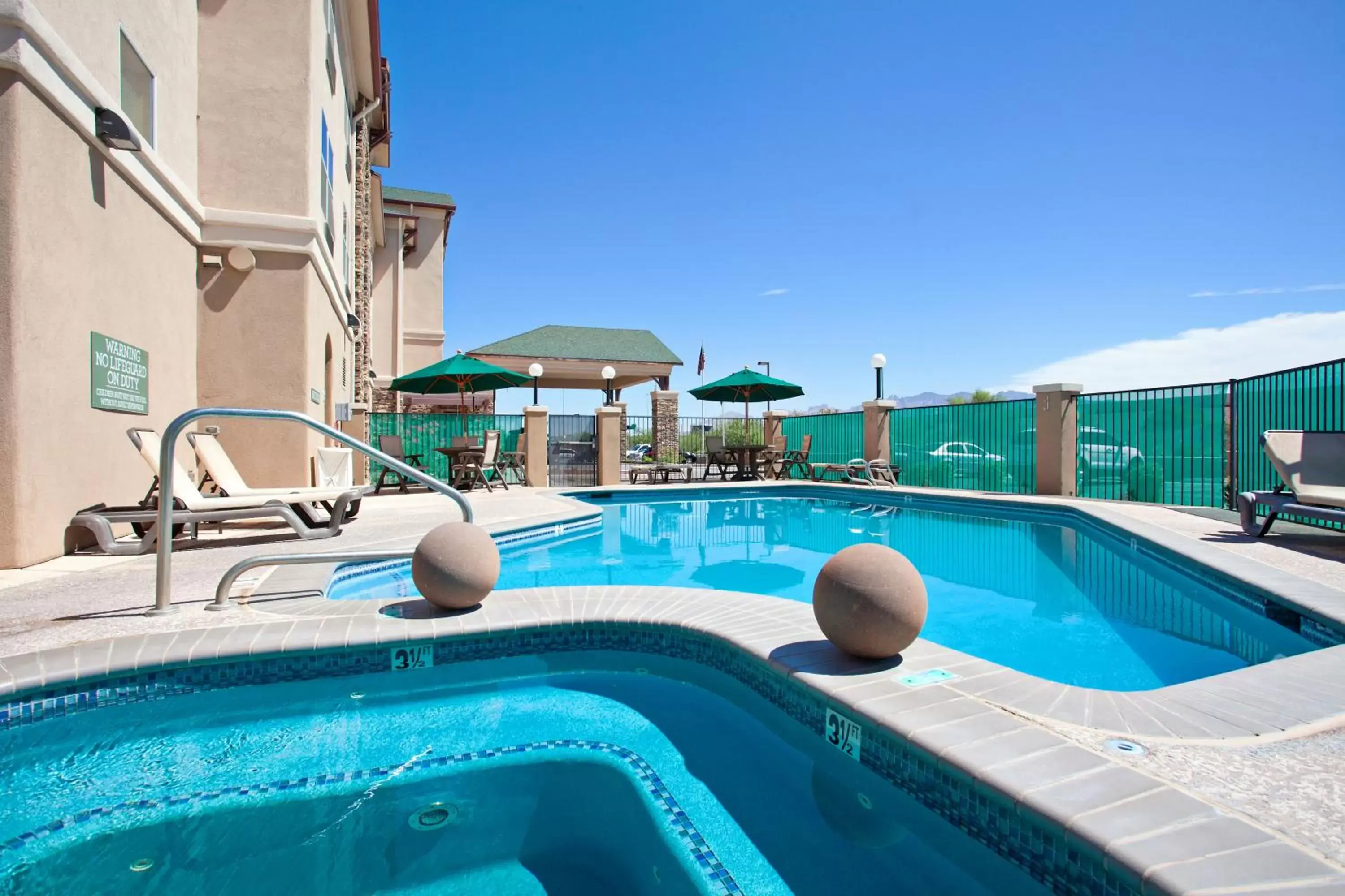 Swimming Pool in Country Inn & Suites by Radisson, Tucson City Center, AZ