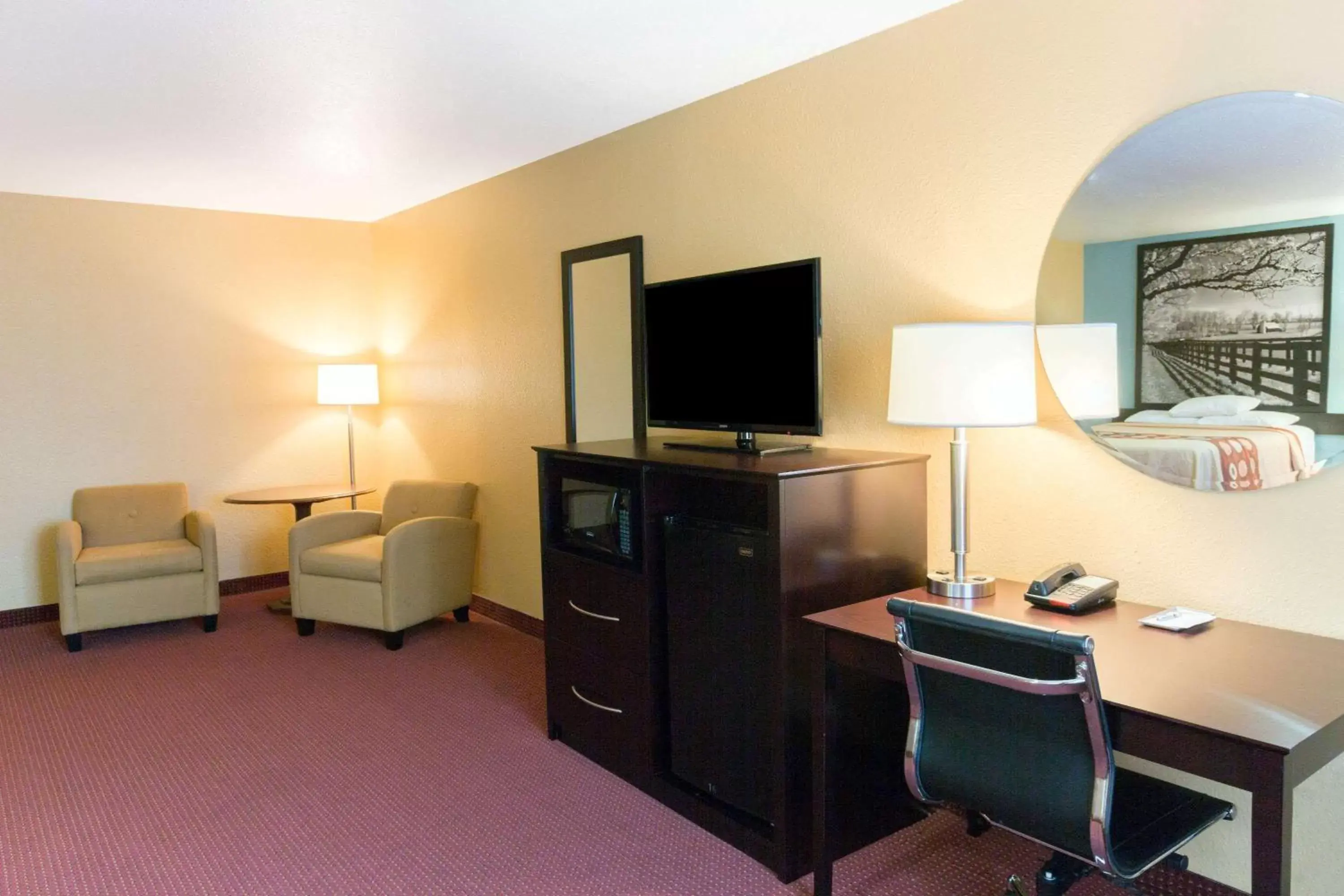 Photo of the whole room, TV/Entertainment Center in Super 8 by Wyndham Richmond