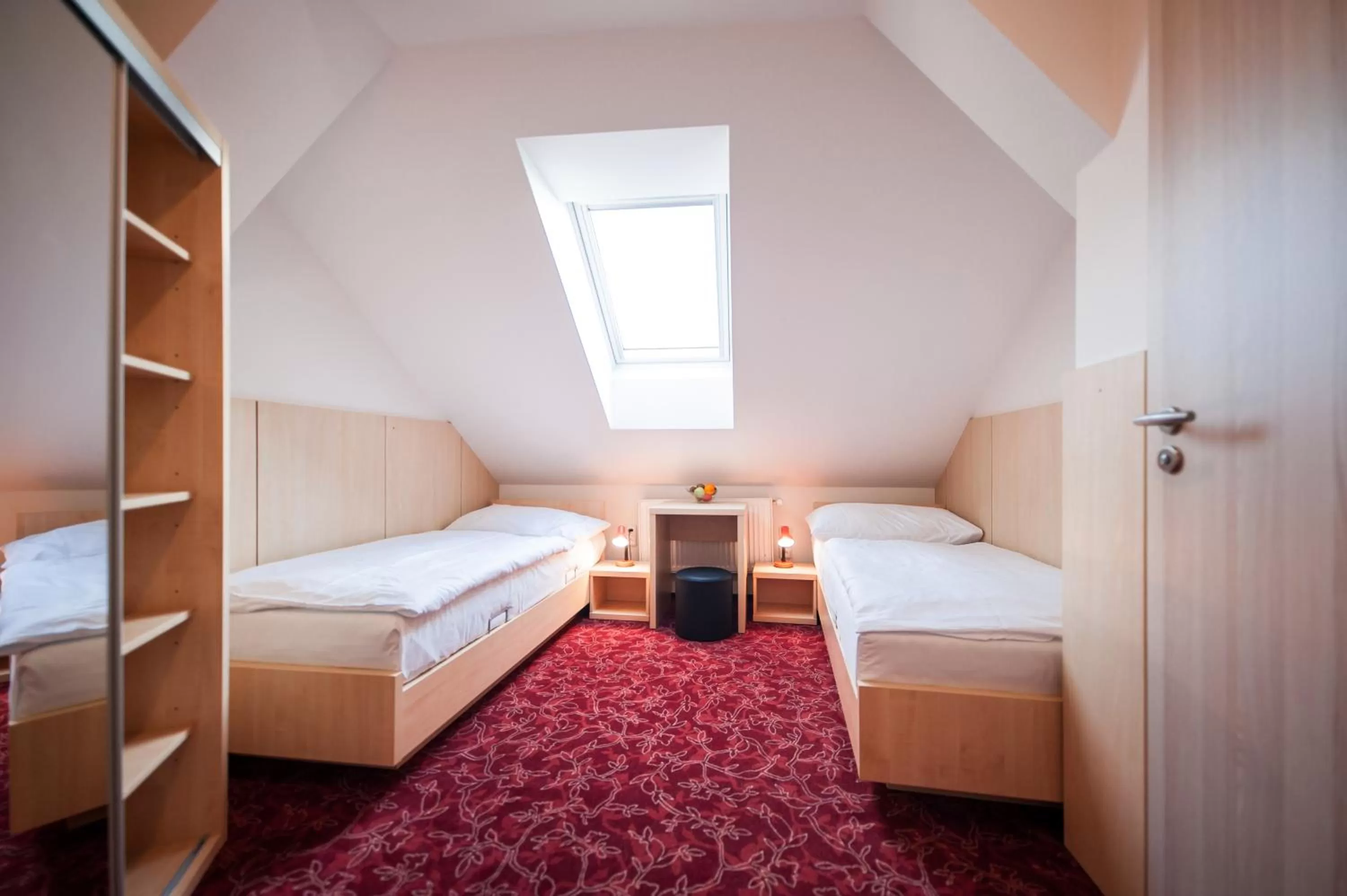 Bed in Hotel Pivovar