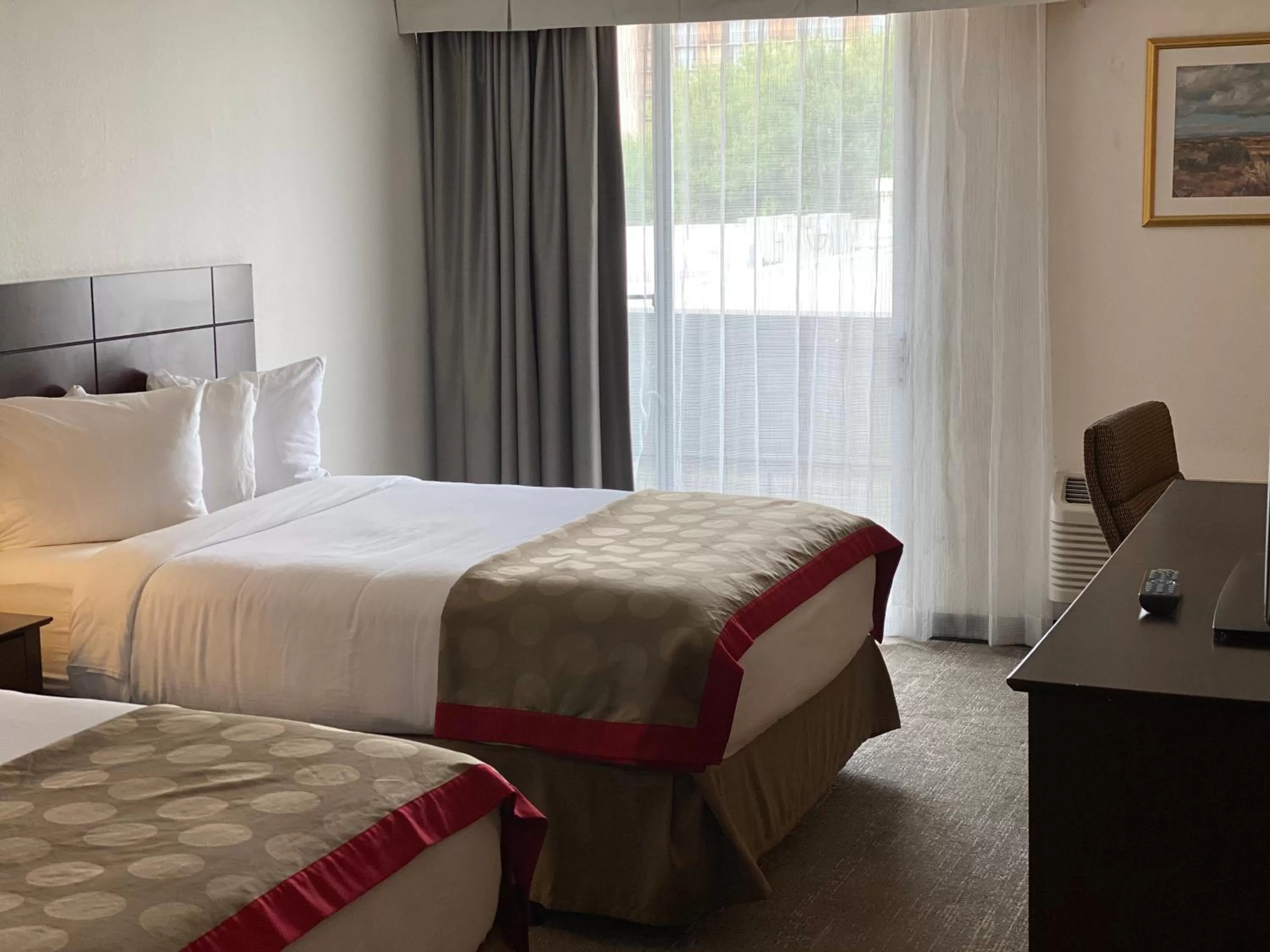 Bed in Ramada by Wyndham Albuquerque Midtown