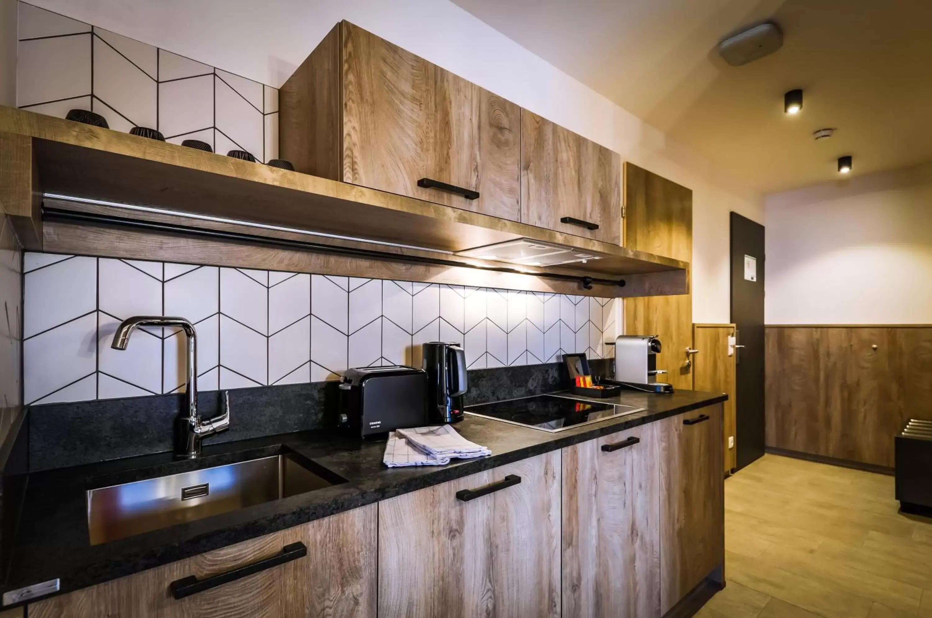 Kitchen or kitchenette, Kitchen/Kitchenette in 24 by AvenidA Hotel & Residences Kaprun