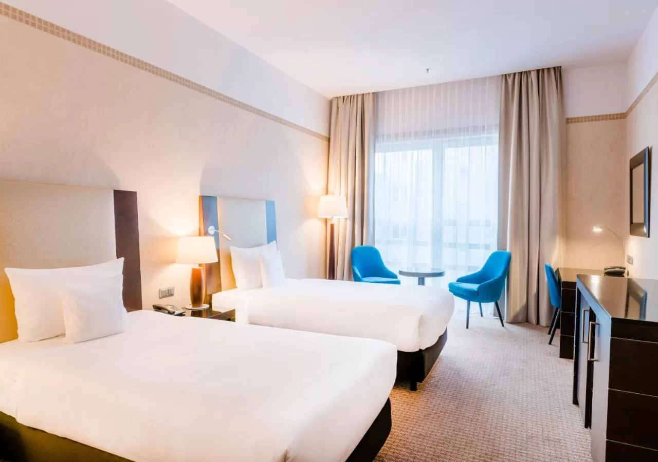 Bed in Hotel Polonia Palace