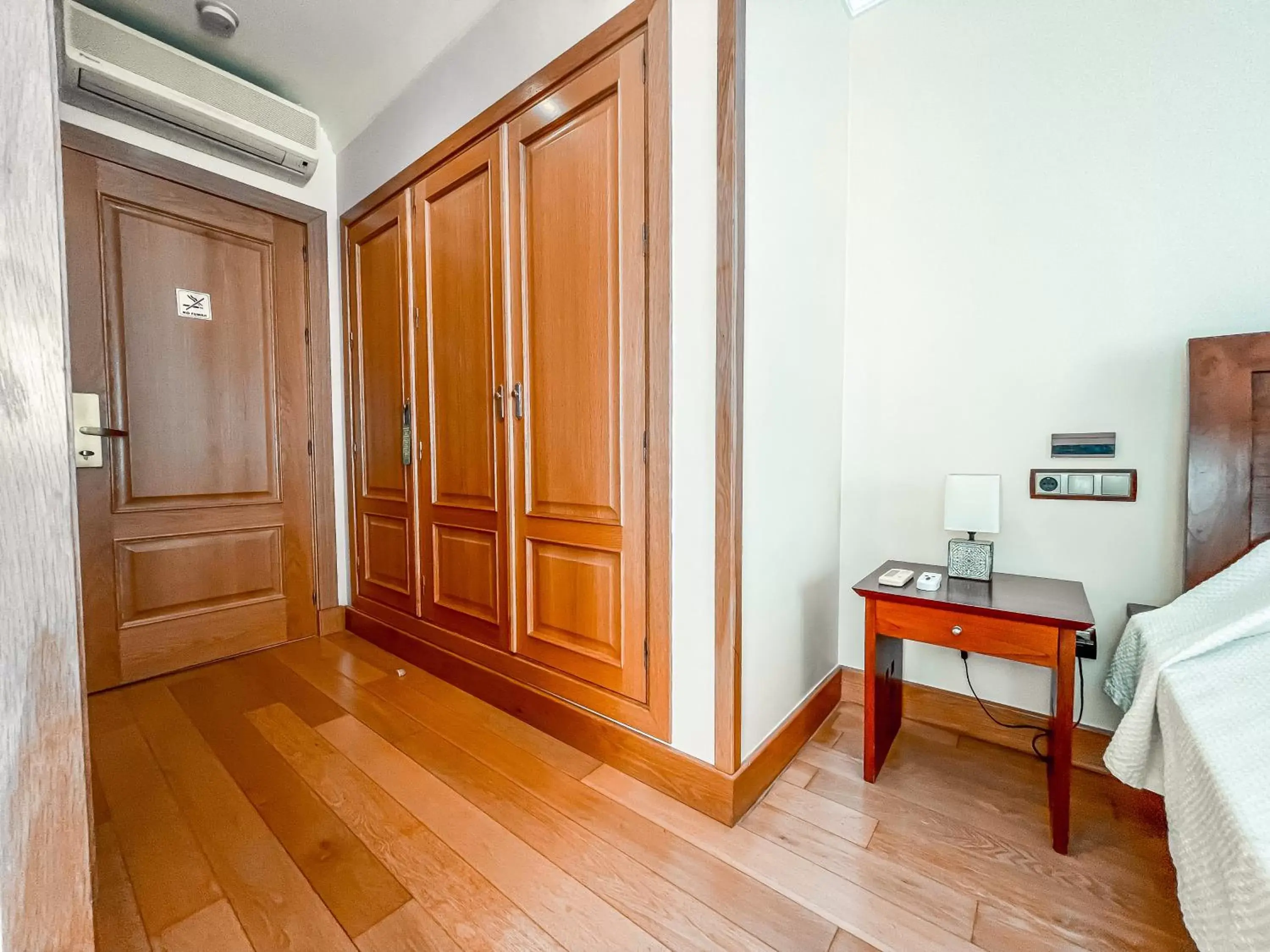 wardrobe, TV/Entertainment Center in The Marbella Heights Boutique Hotel