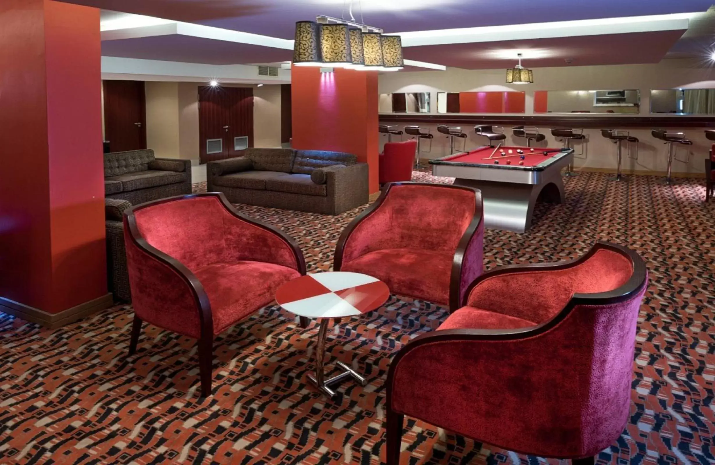 Communal lounge/ TV room in Park Inn by Radisson Abeokuta