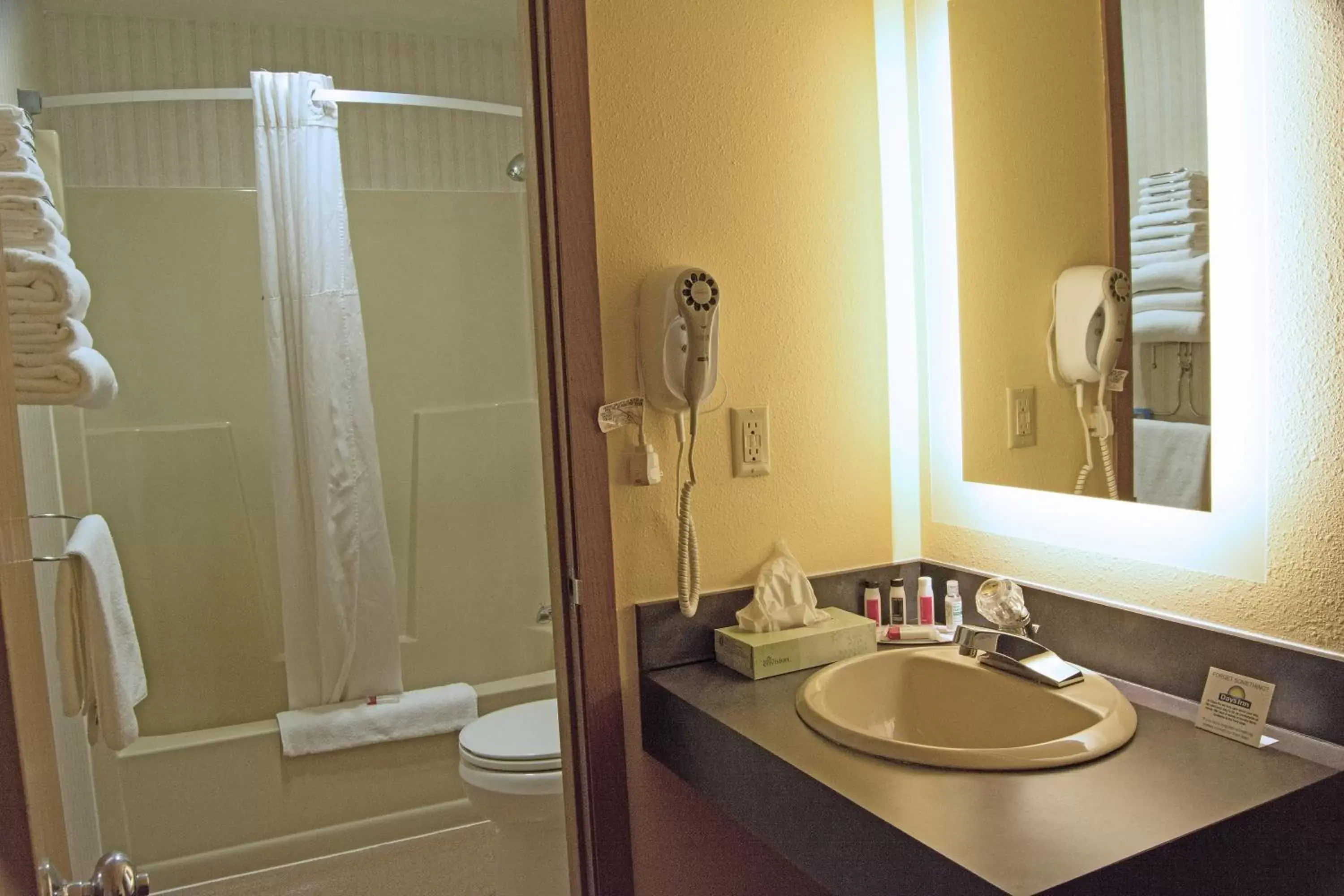 Bathroom in Days Inn by Wyndham Marquette