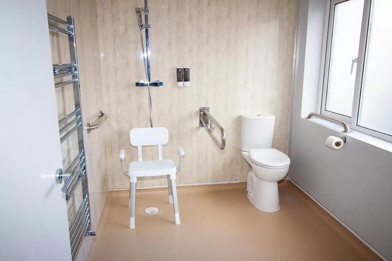 Bathroom in OYO Studiotel GY - Modern Hotel Apartments