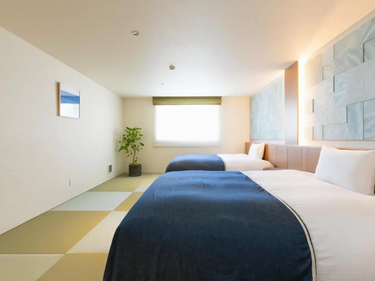 Bed in Nagi Kurashiki Hotel&Lounge