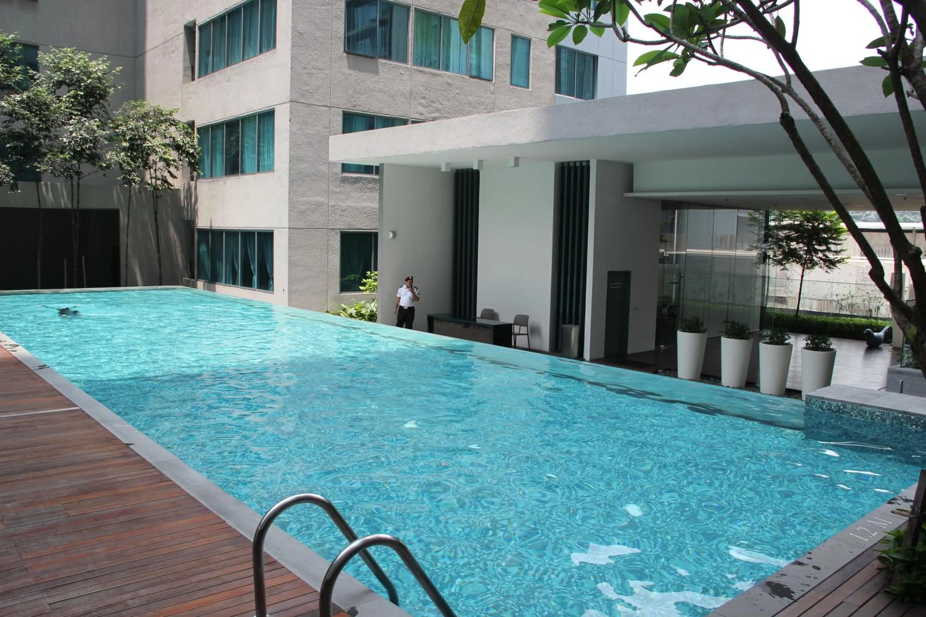 Swimming pool in Summer Suites Residences by Subhome
