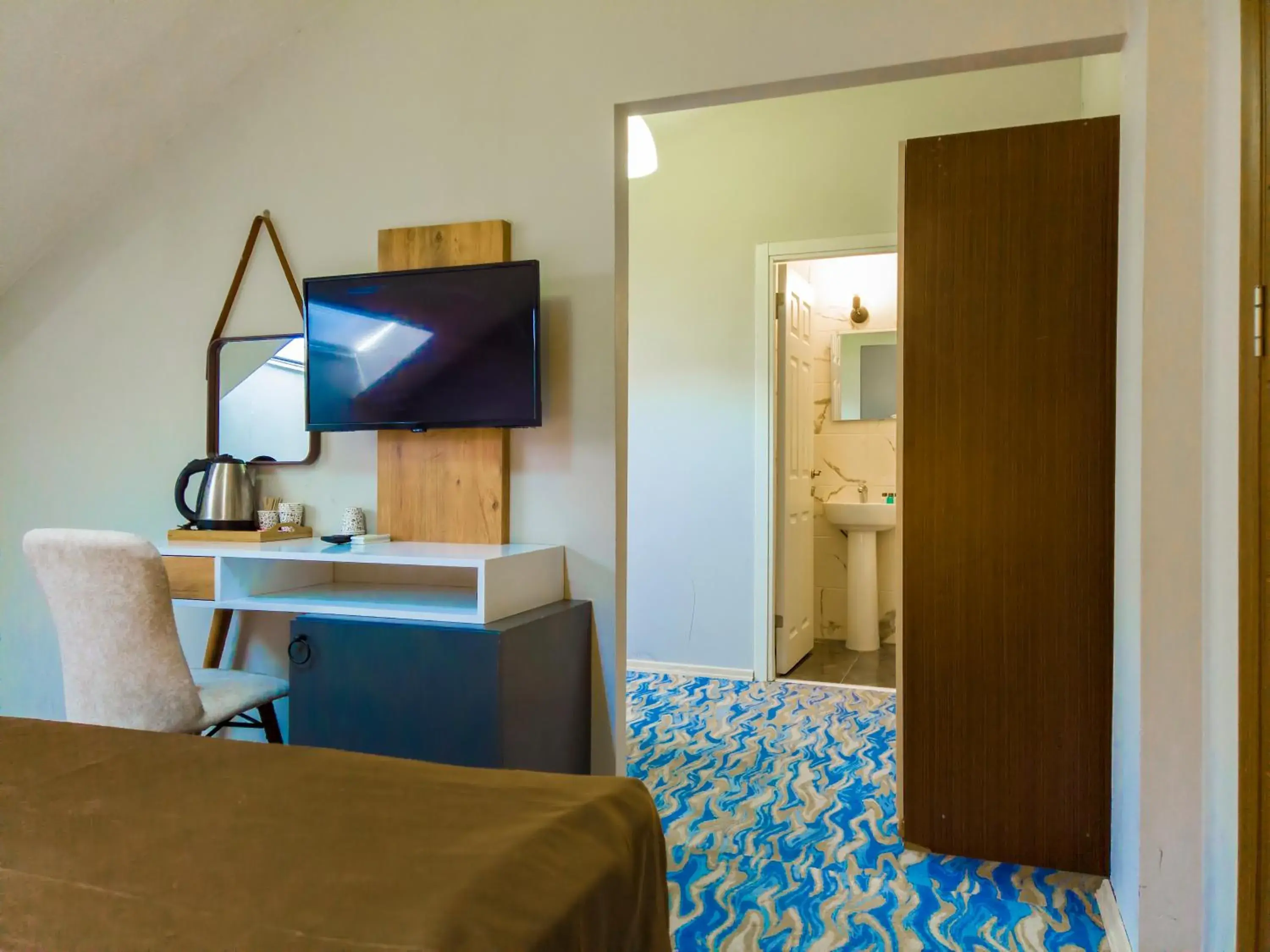 TV and multimedia, TV/Entertainment Center in Privado Hotels