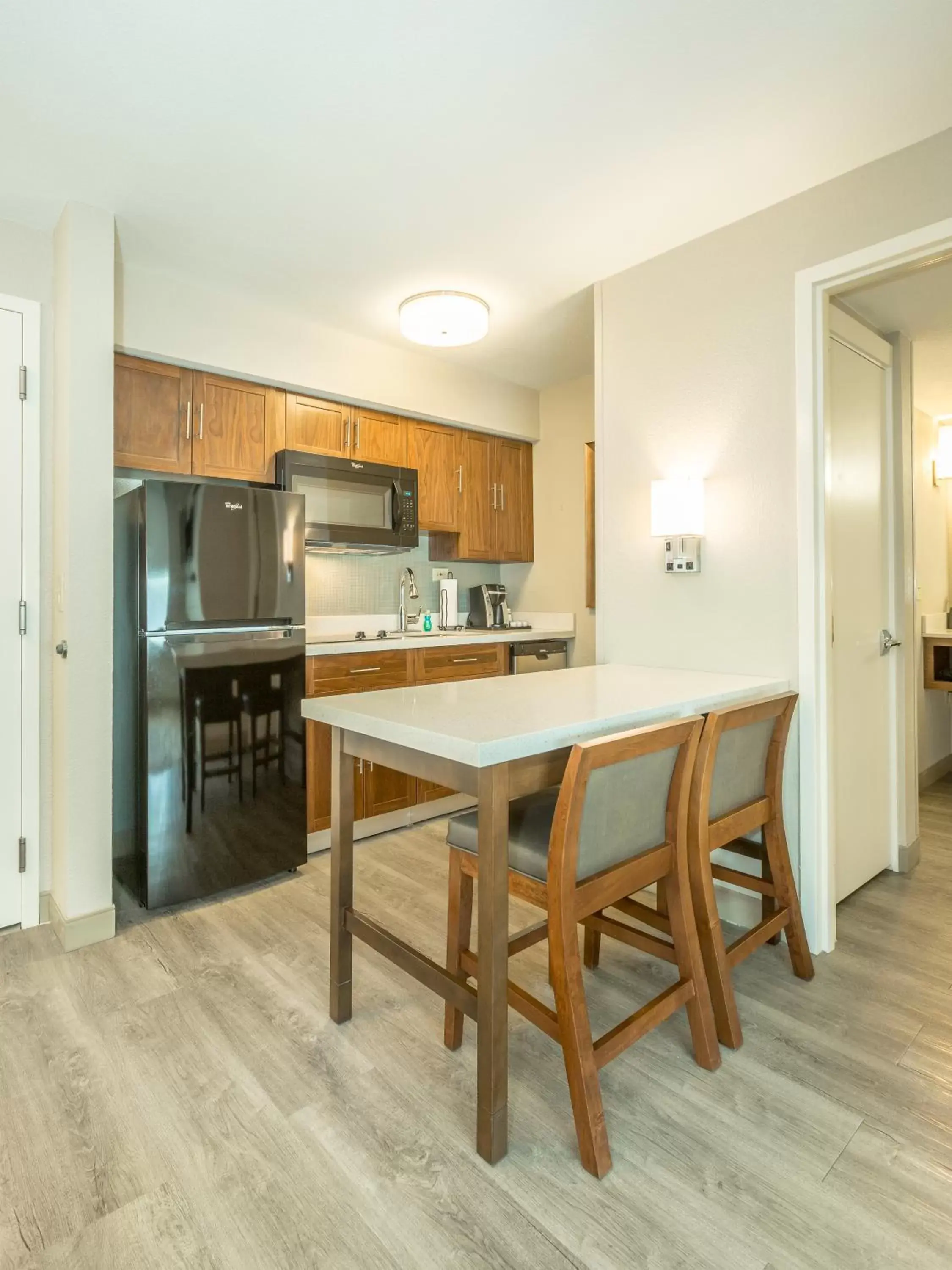 Kitchen or kitchenette, Kitchen/Kitchenette in Holiday Inn Hotel and Suites Peachtree City, an IHG Hotel