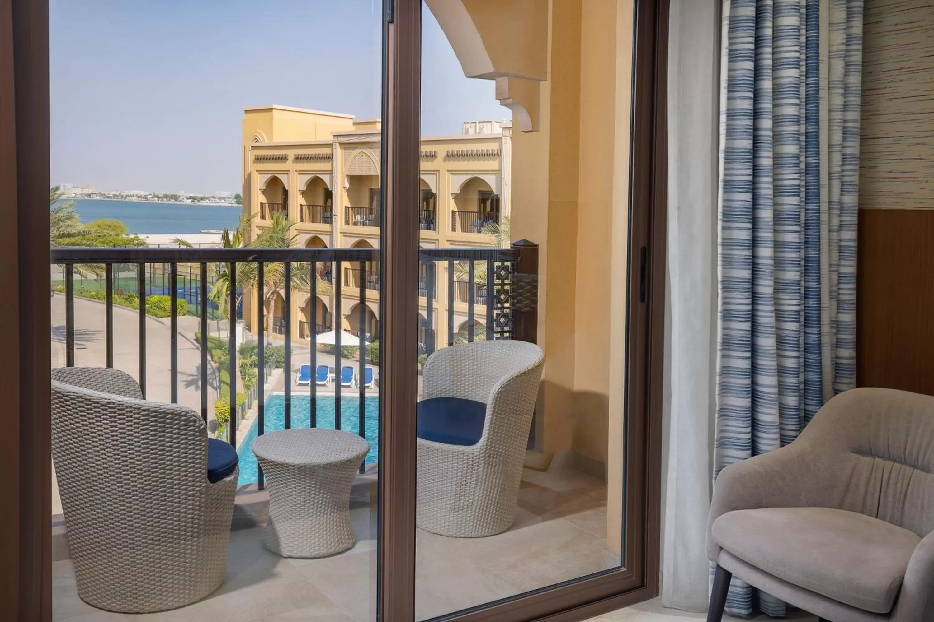 Twin Guest Room with Balcony in DoubleTree by Hilton Resort & Spa Marjan Island Twin Guest Room with Balcony in DoubleTree by Hilton Resort & Spa Marjan Island