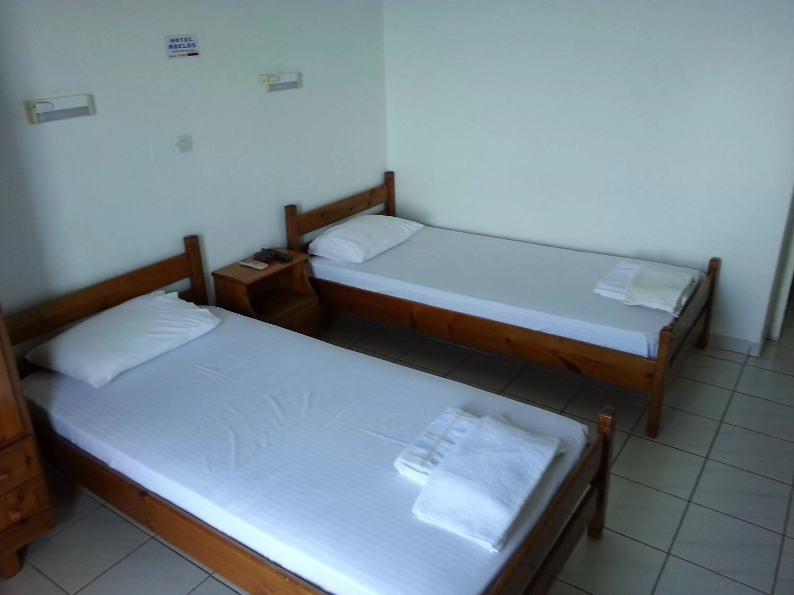 Bed in Angelos Hotel