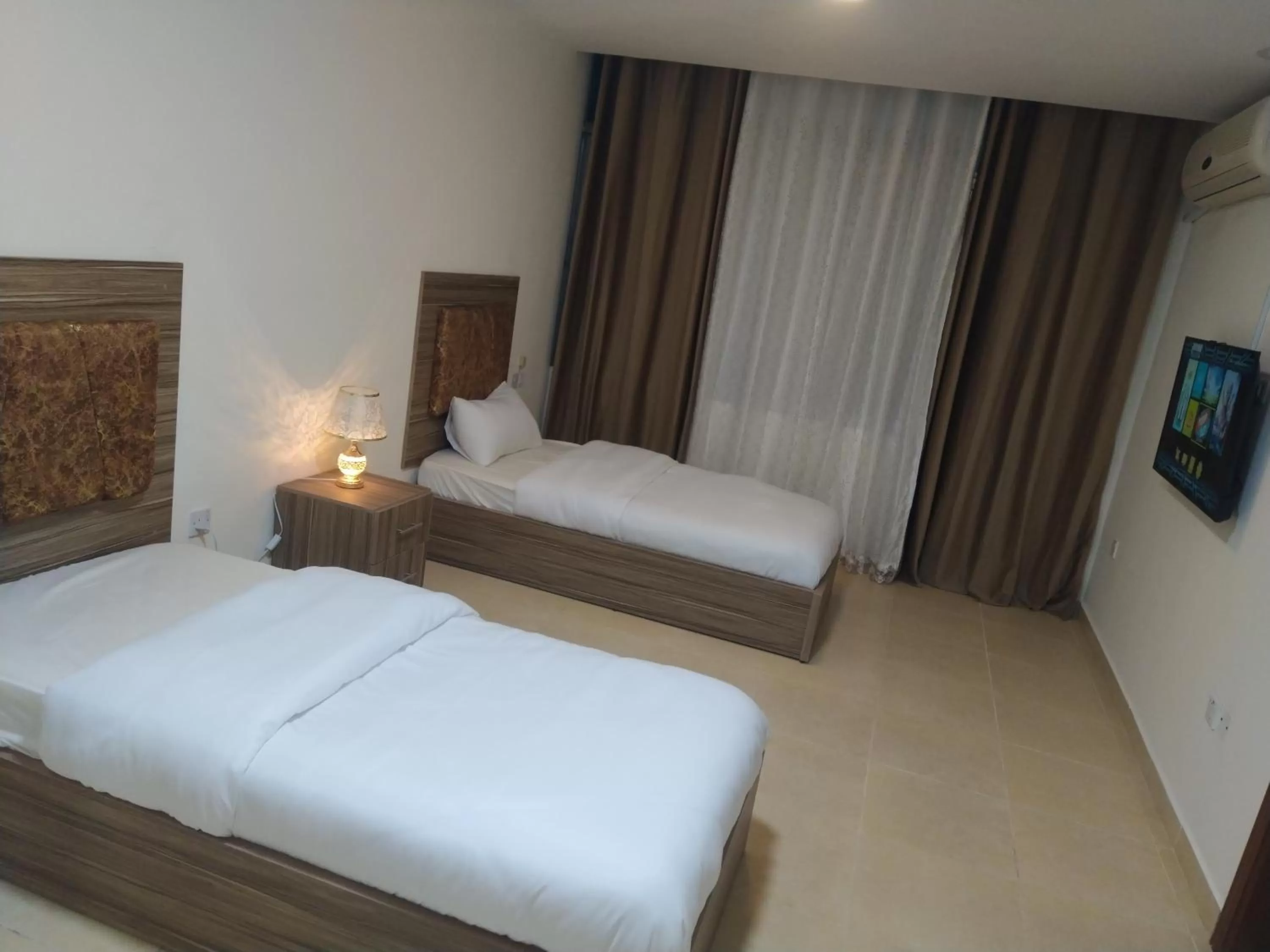 Photo of the whole room, Bed in Rayan Hotel Suites