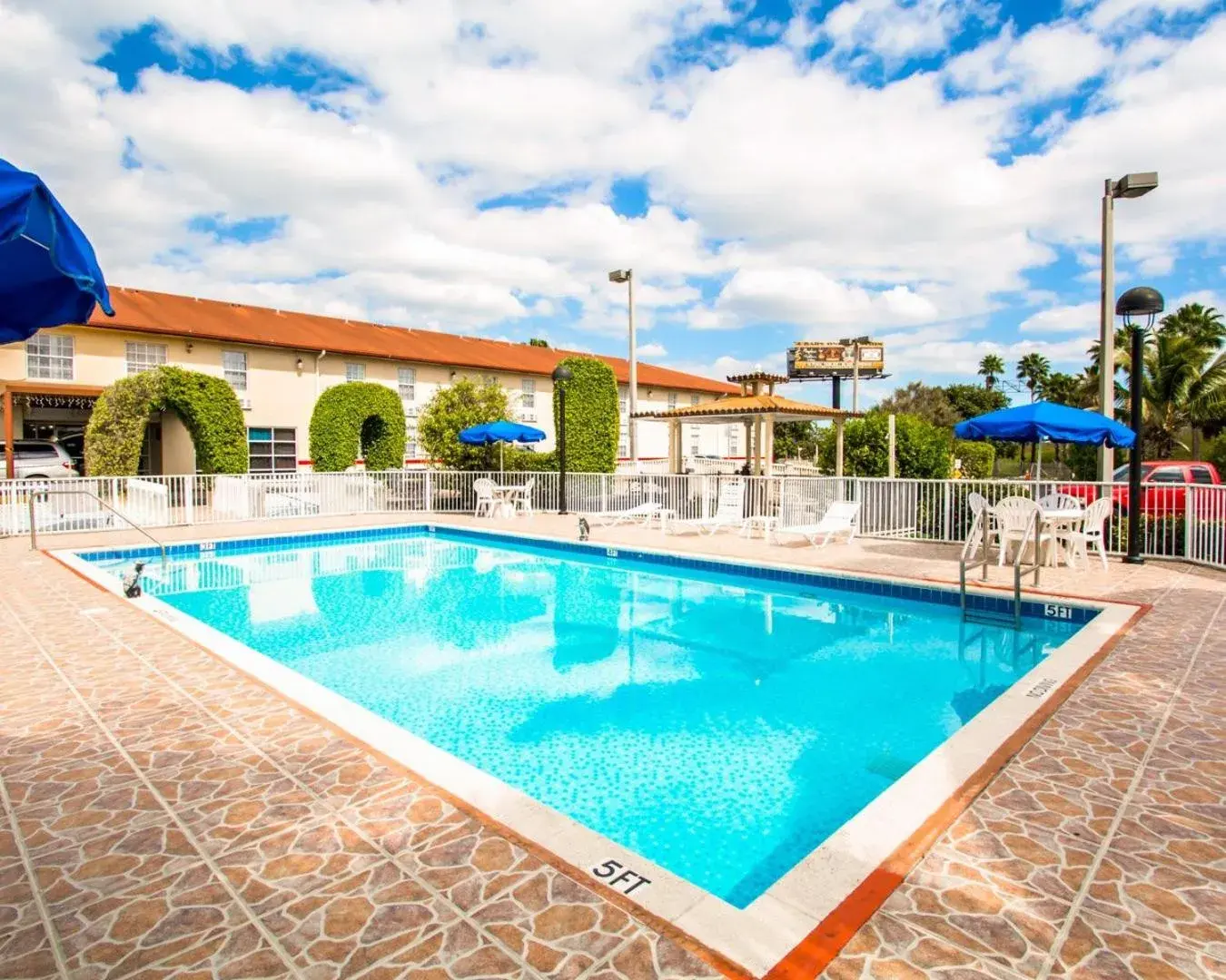 Swimming pool, Property Building in Baymont by Wyndham Florida City