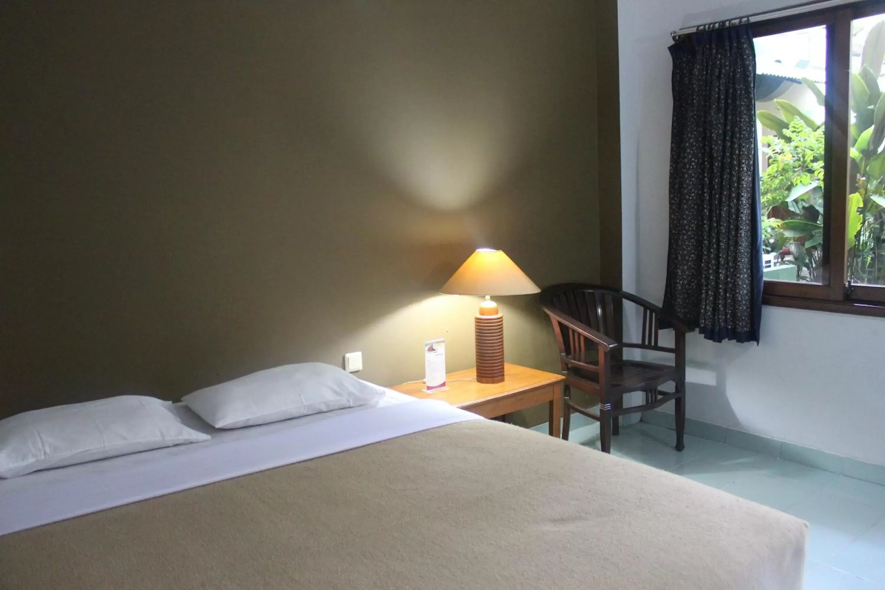 Bedroom, Room Photo in Hotel Winotosastro Garden