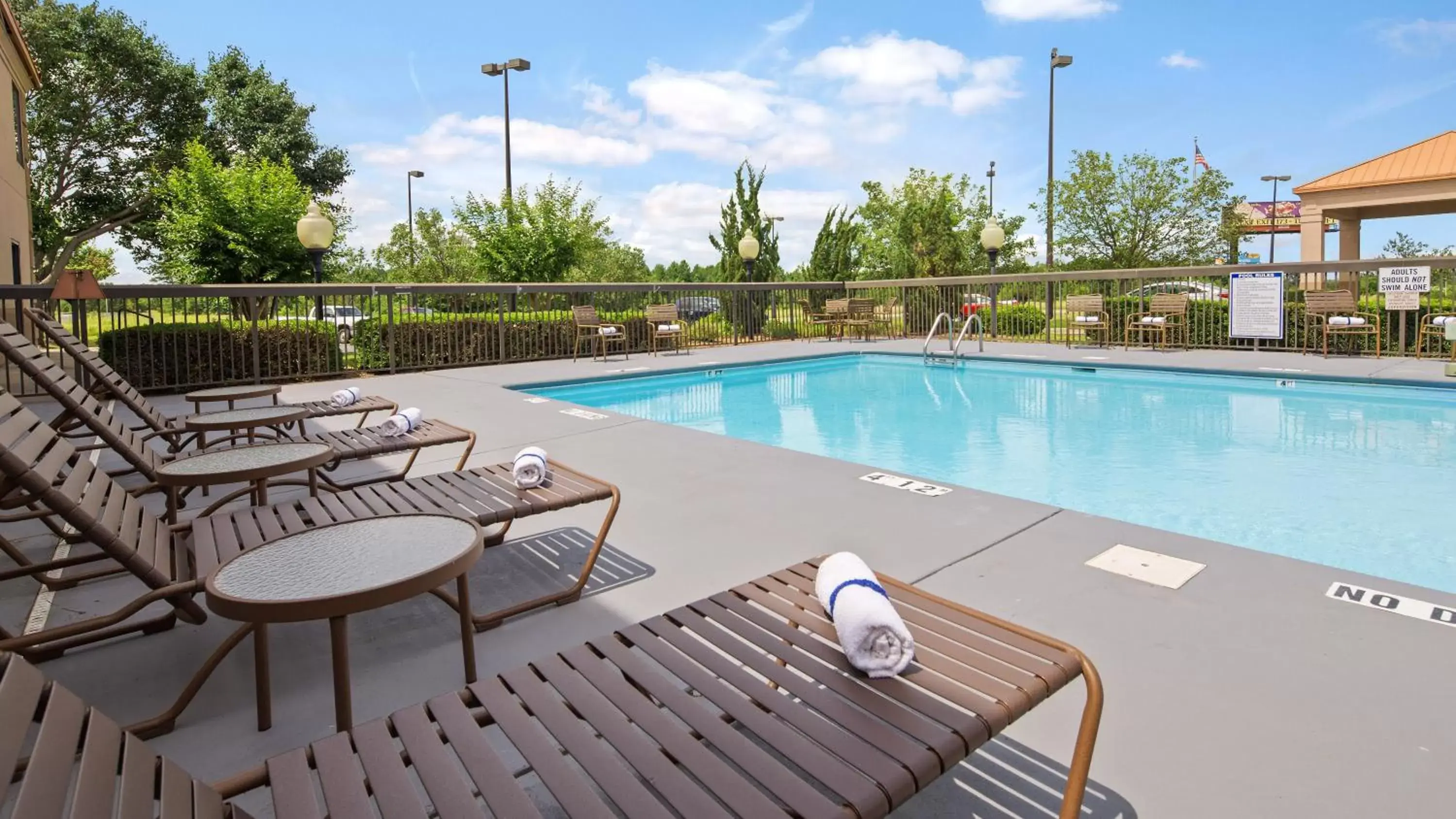 Swimming Pool in SureStay Plus Hotel by Best Western Roanoke Rapids I-95