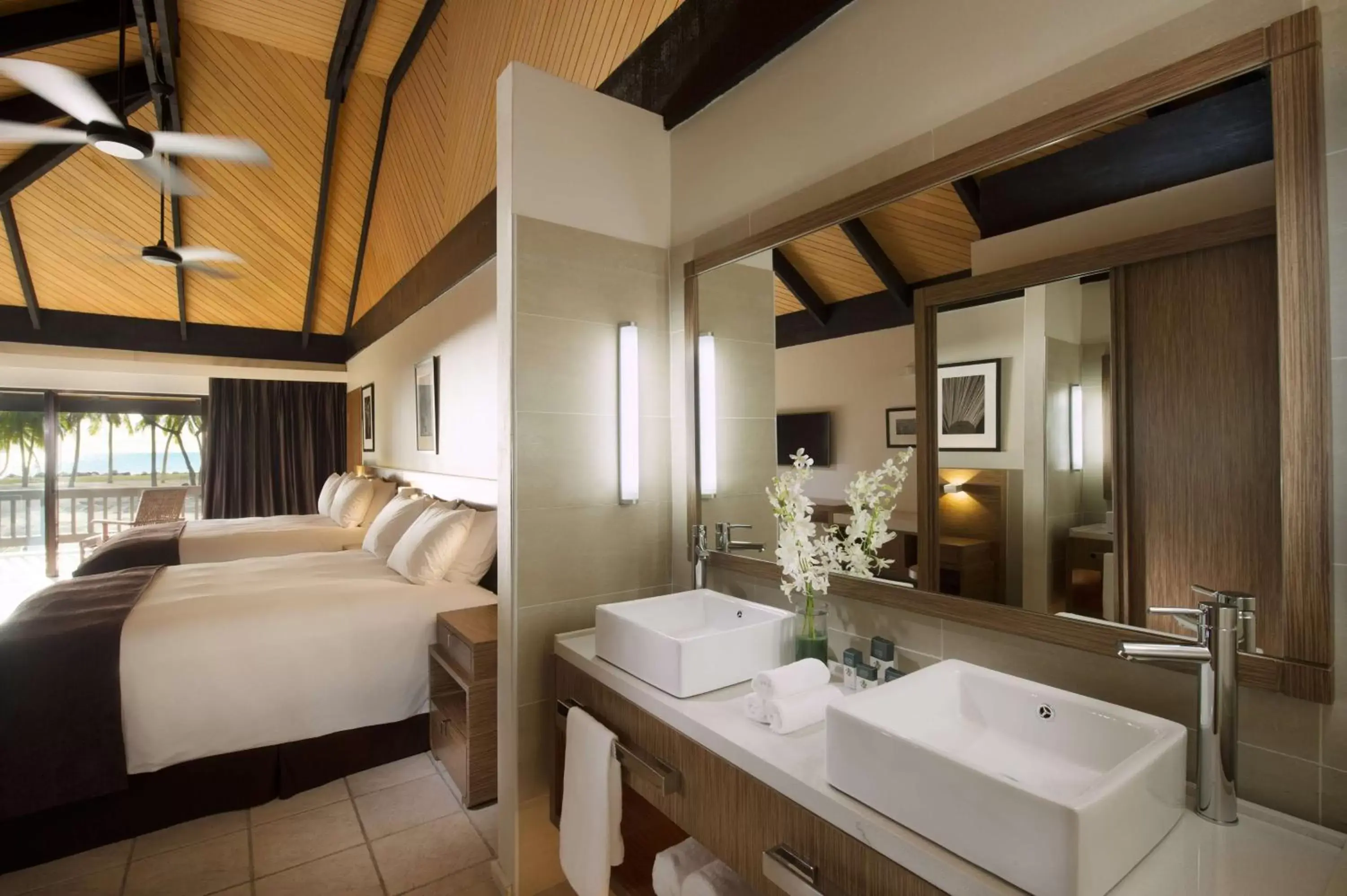 Bed, Bathroom in DoubleTree by Hilton Fiji - Sonaisali Island