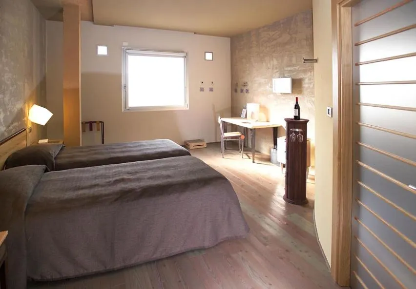 Bed in Albergo Cantine Ascheri