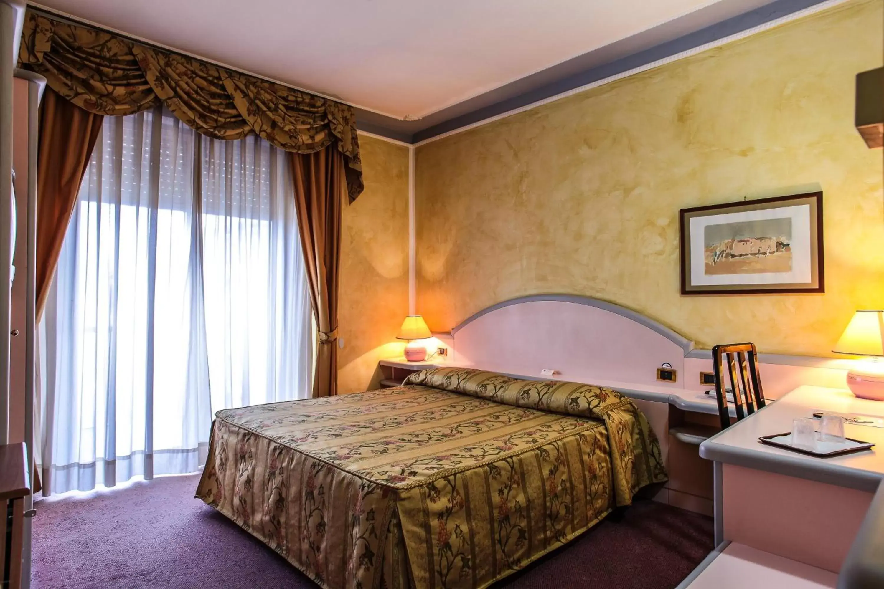 Bed in Hotel Grazia Deledda
