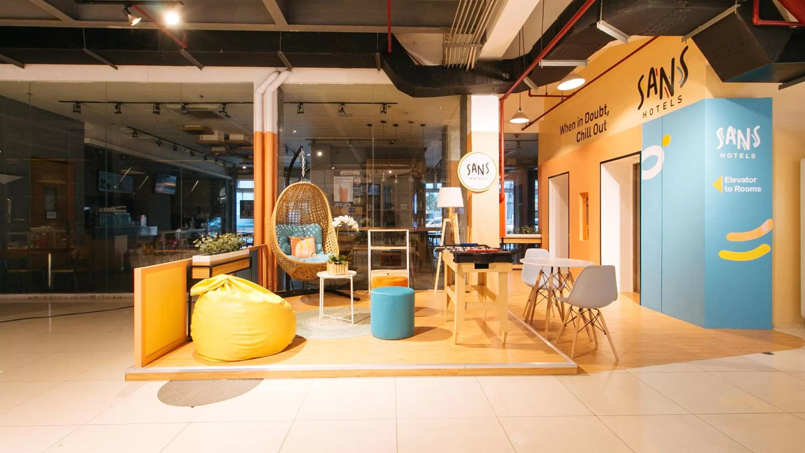 Seating area in Sans Hotel Laperal Manila