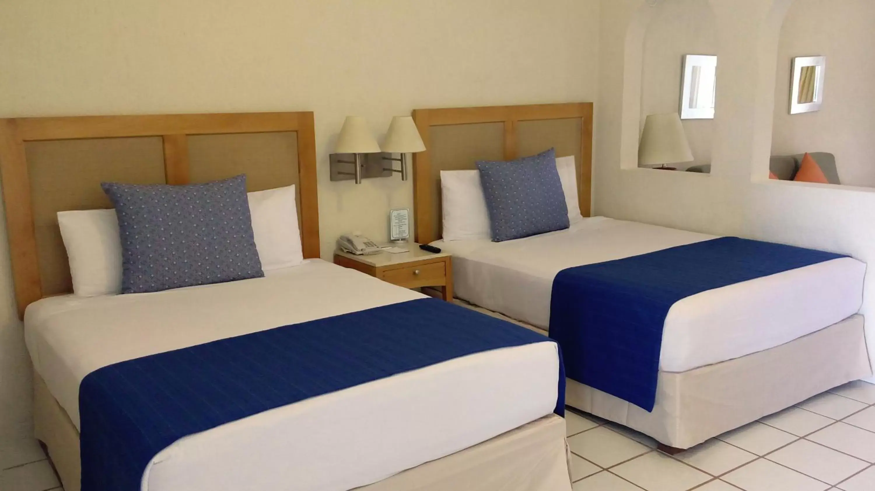 Bed in Park Royal Homestay Los Cabos